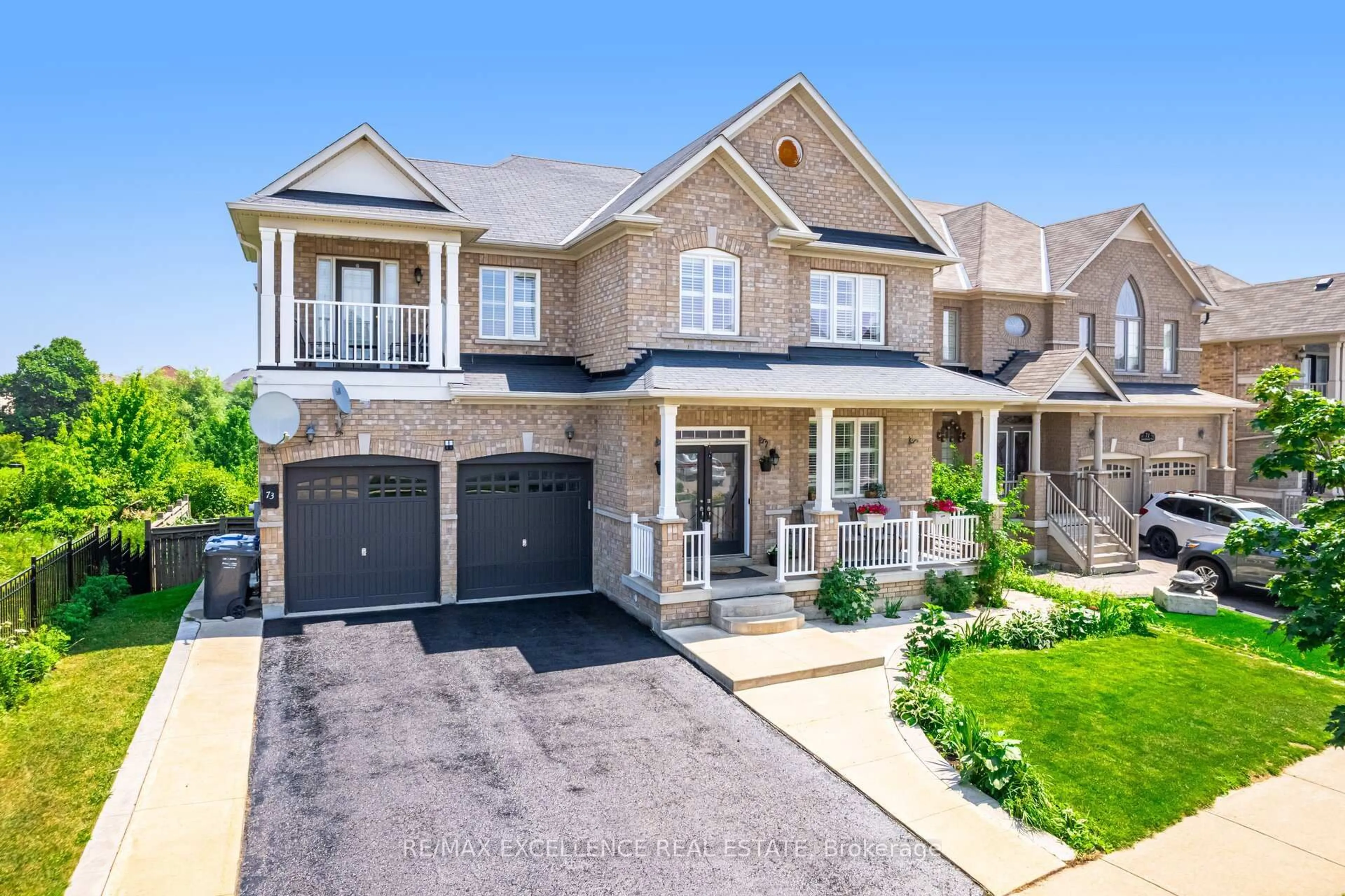 Home with brick exterior material, street for 73 Gardenbrooke Tr, Brampton Ontario L6P 3J3