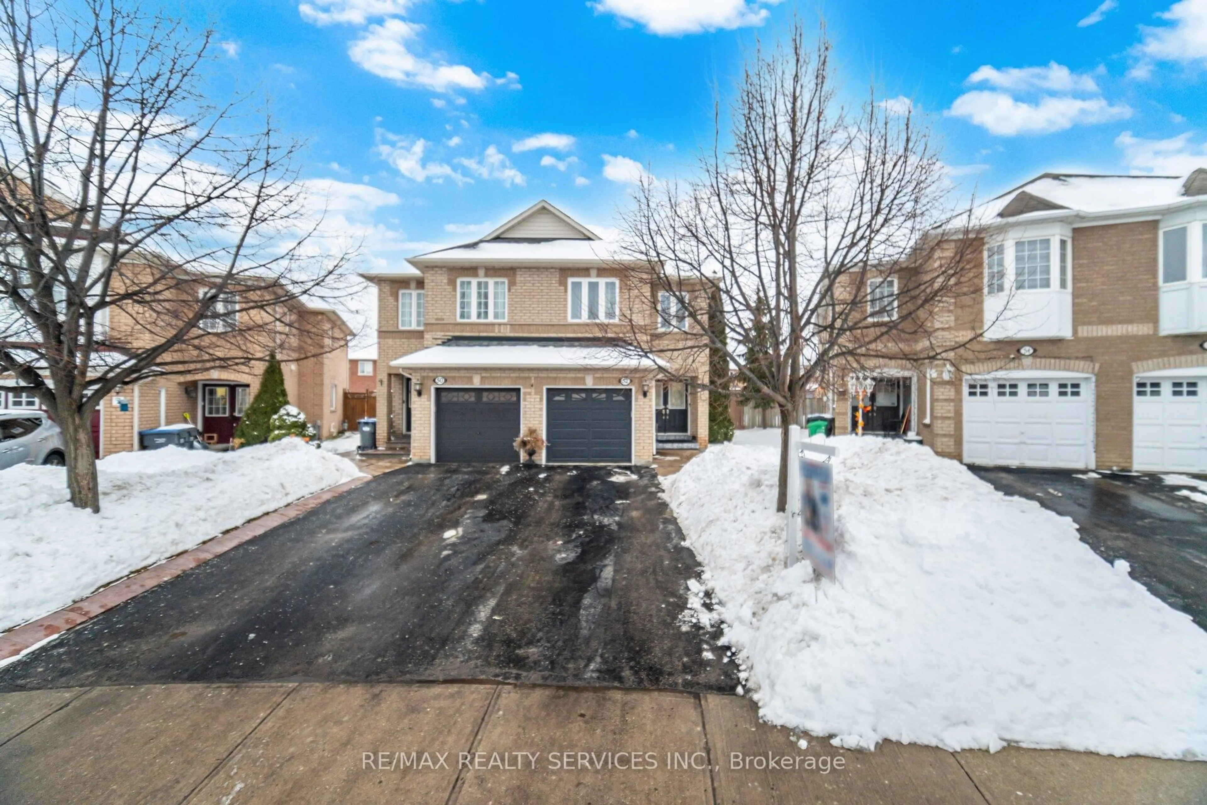 A pic from outside/outdoor area/front of a property/back of a property/a pic from drone, street for 52 Native Landing, Brampton Ontario L6X 5B1