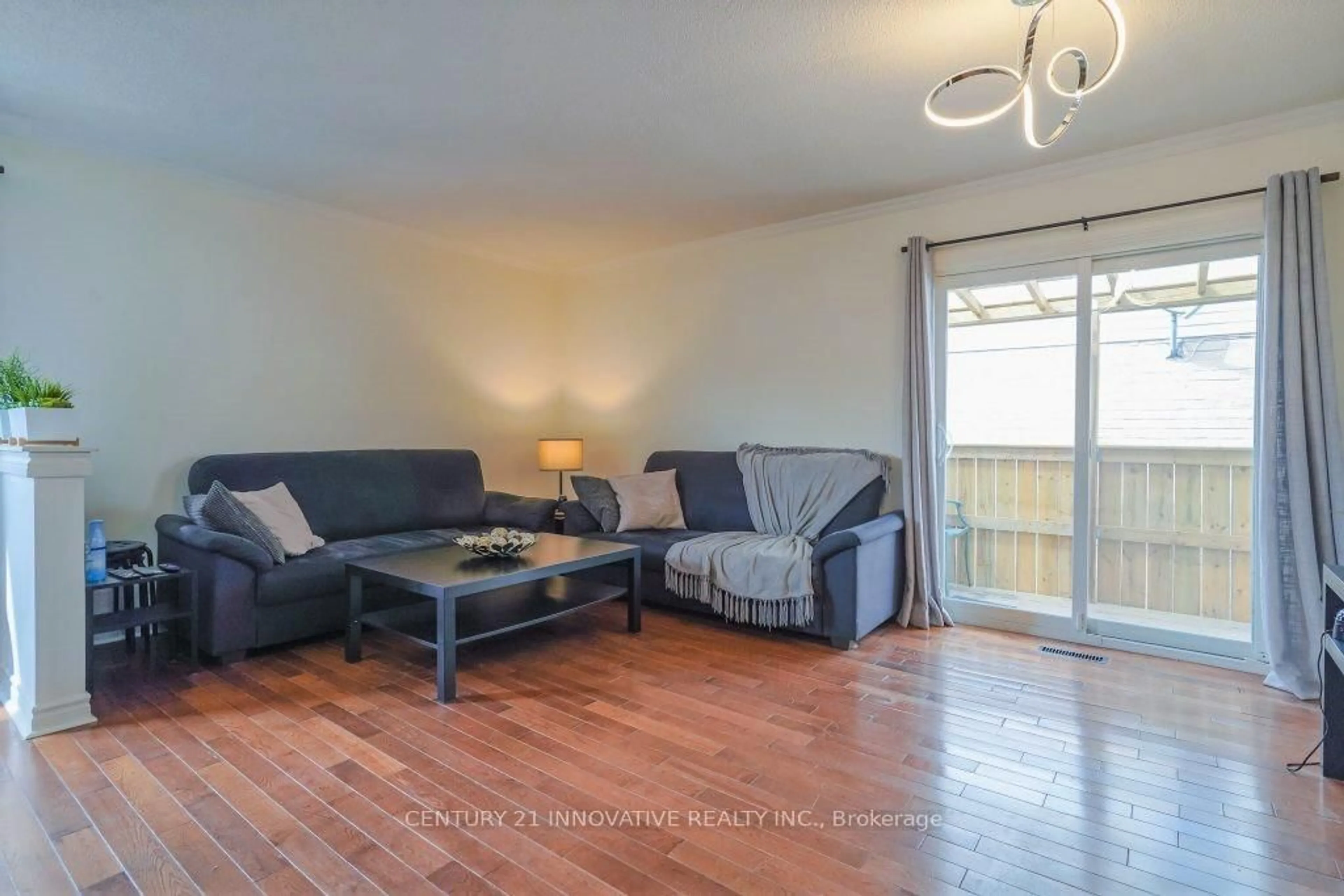 Living room with furniture, wood/laminate floor for 3066 Patrick Cres, Mississauga Ontario L5N 3G5