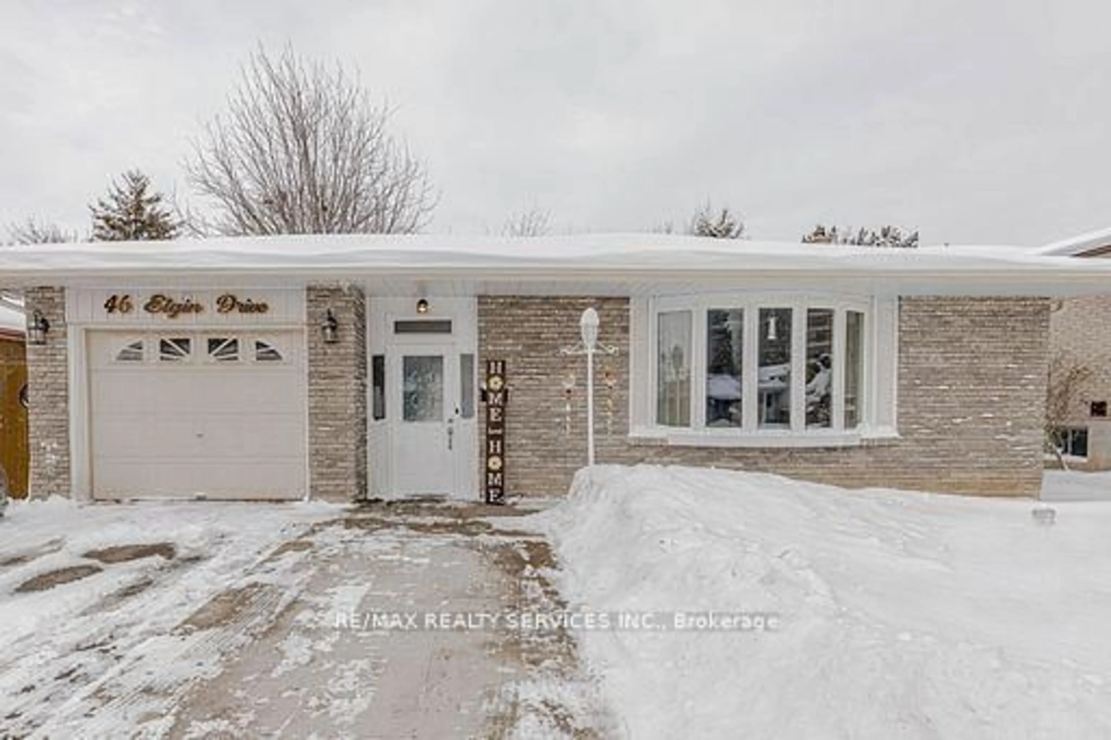 Home with brick exterior material, street for 46 Elgin Dr, Brampton Ontario L6Y 1A8