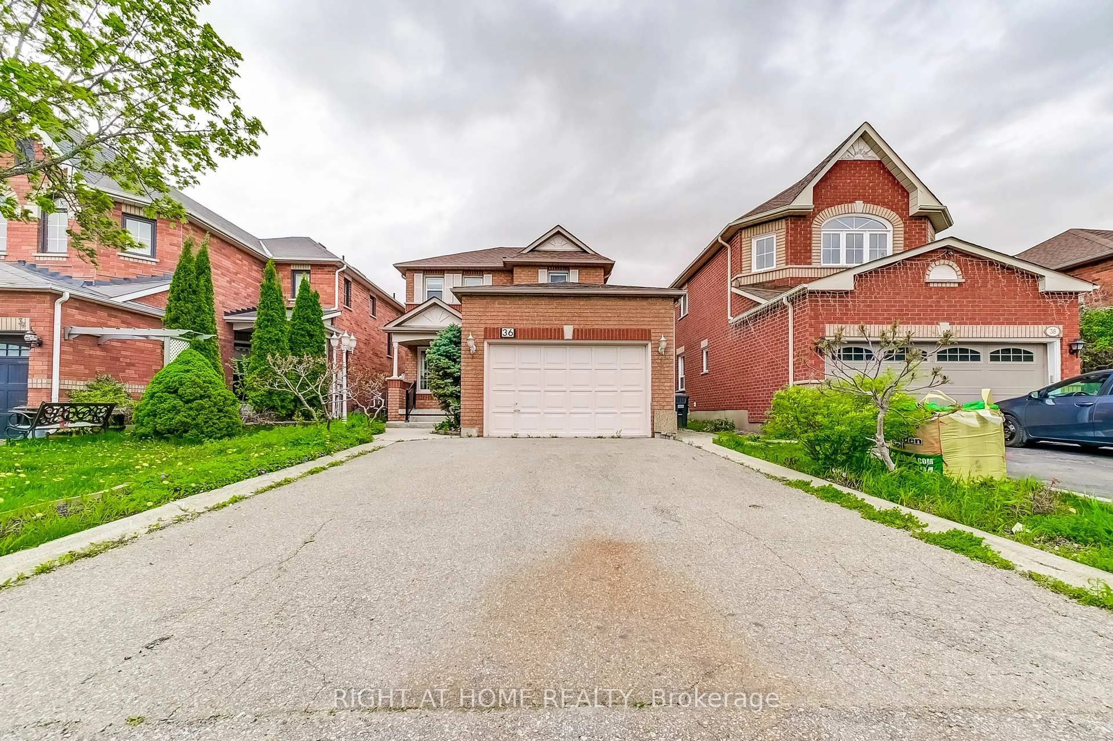 Home with brick exterior material, street for 36 Mapleshade Dr, Brampton Ontario L7A 1J1