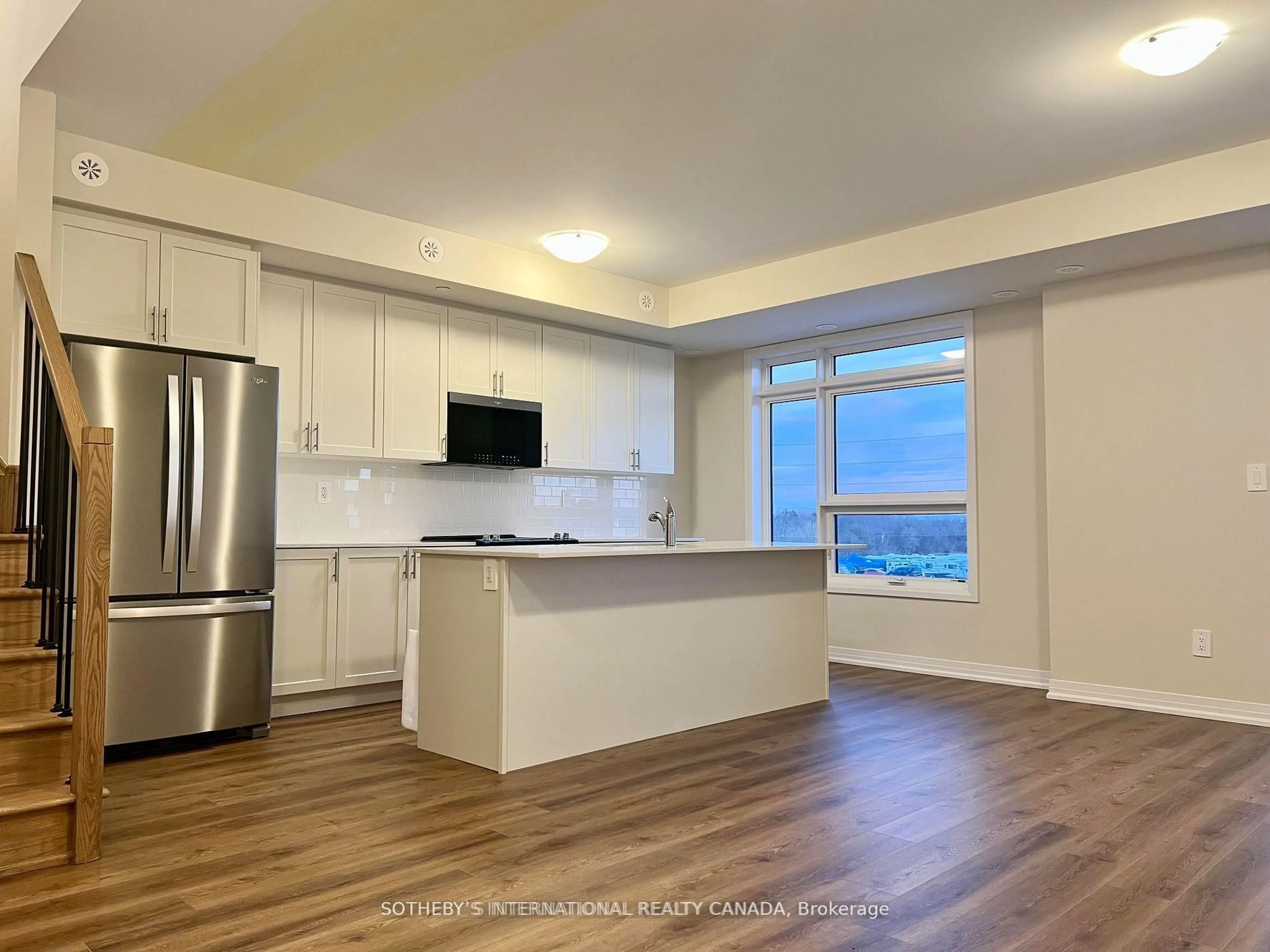 Open concept kitchen, unknown for 1585 Rose Way #103, Milton Ontario L9T 7E7