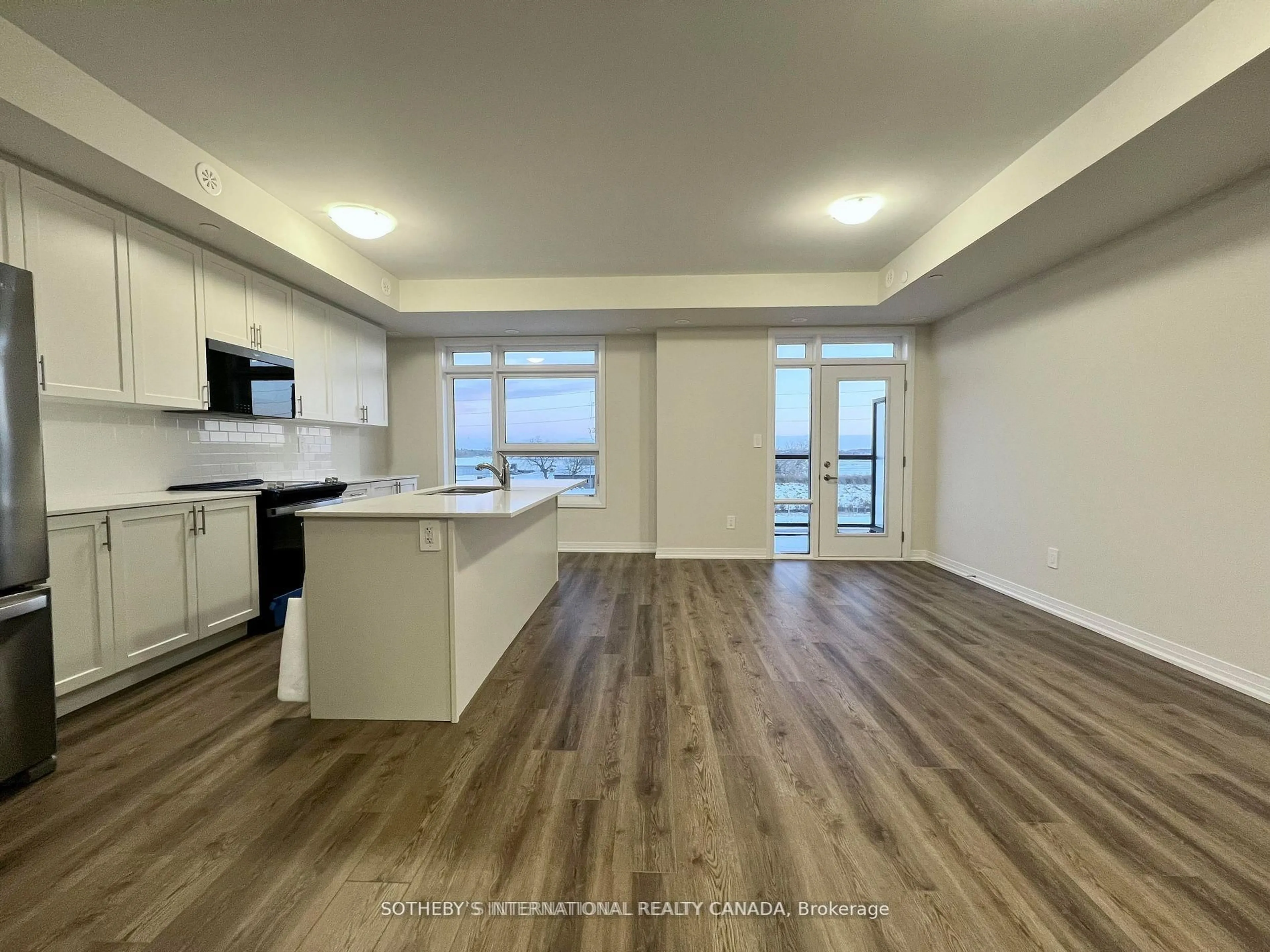 Open concept kitchen, unknown for 1585 Rose Way #103, Milton Ontario L9T 7E7