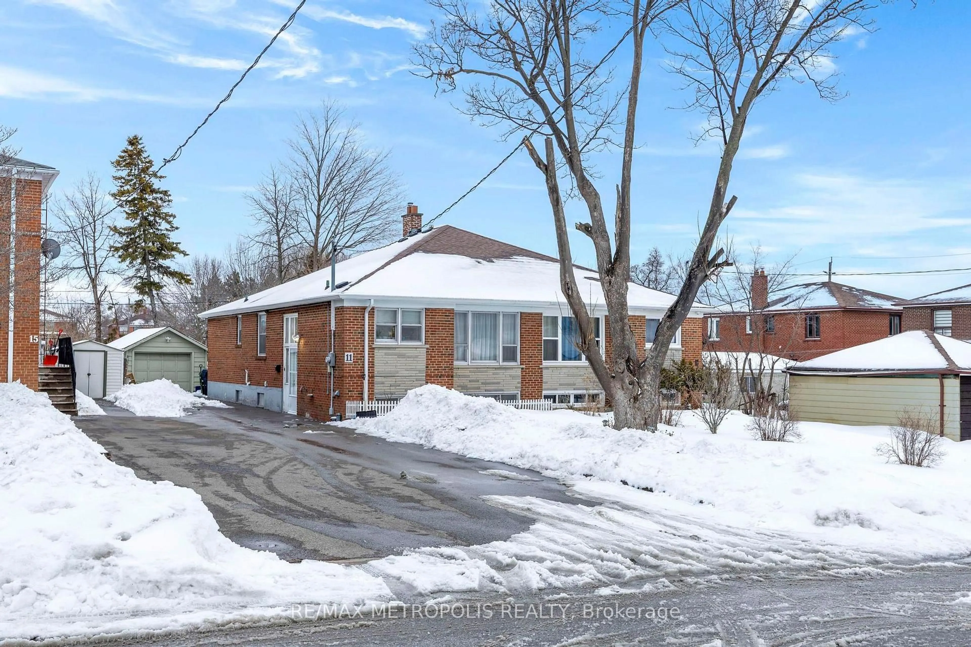 Home with brick exterior material, street for 11 Rambler Pl, Toronto Ontario M3L 1N6