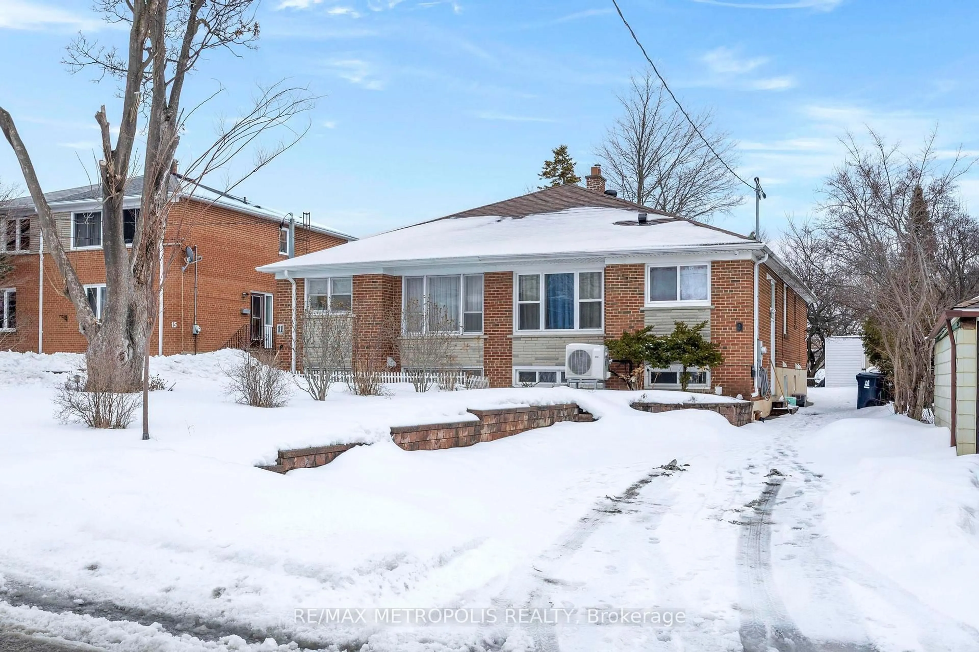 Home with brick exterior material, street for 11 Rambler Pl, Toronto Ontario M3L 1N6