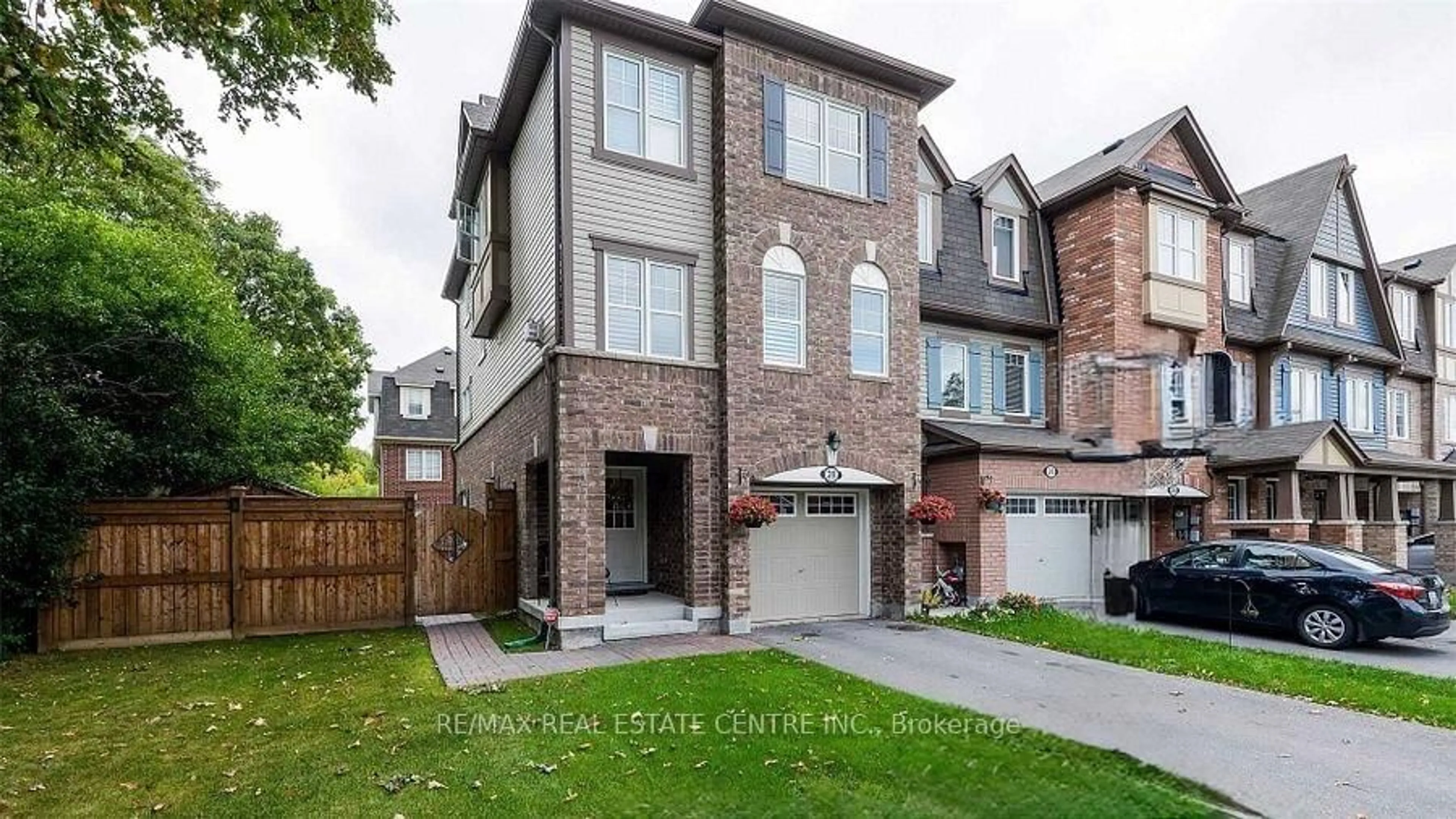 Home with brick exterior material, street for 28 Colonel Frank Ching Cres, Brampton Ontario L6Y 5W5
