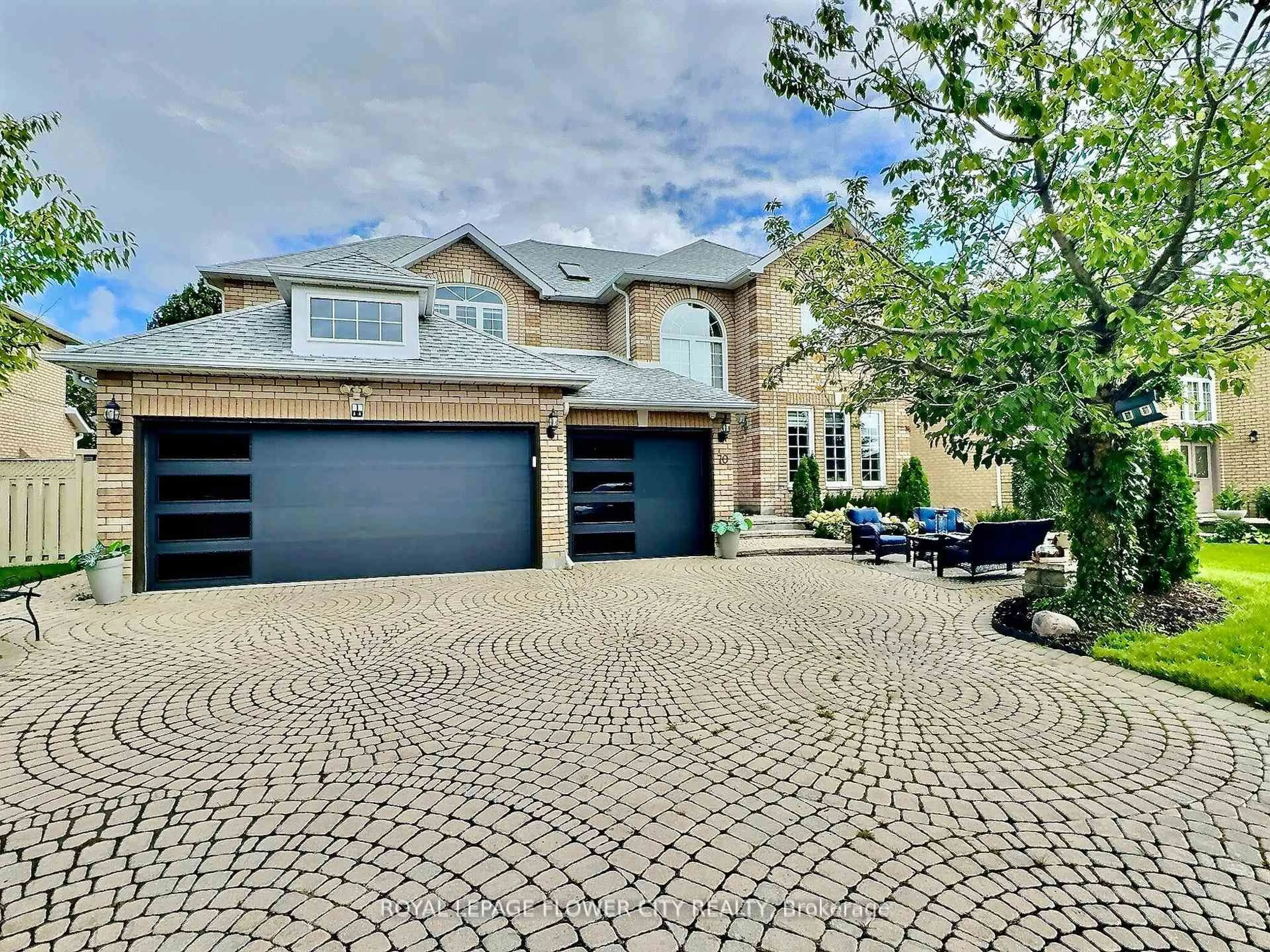 Home with brick exterior material, street for 70 Colonel Bertram Rd, Brampton Ontario L6Z 4T6