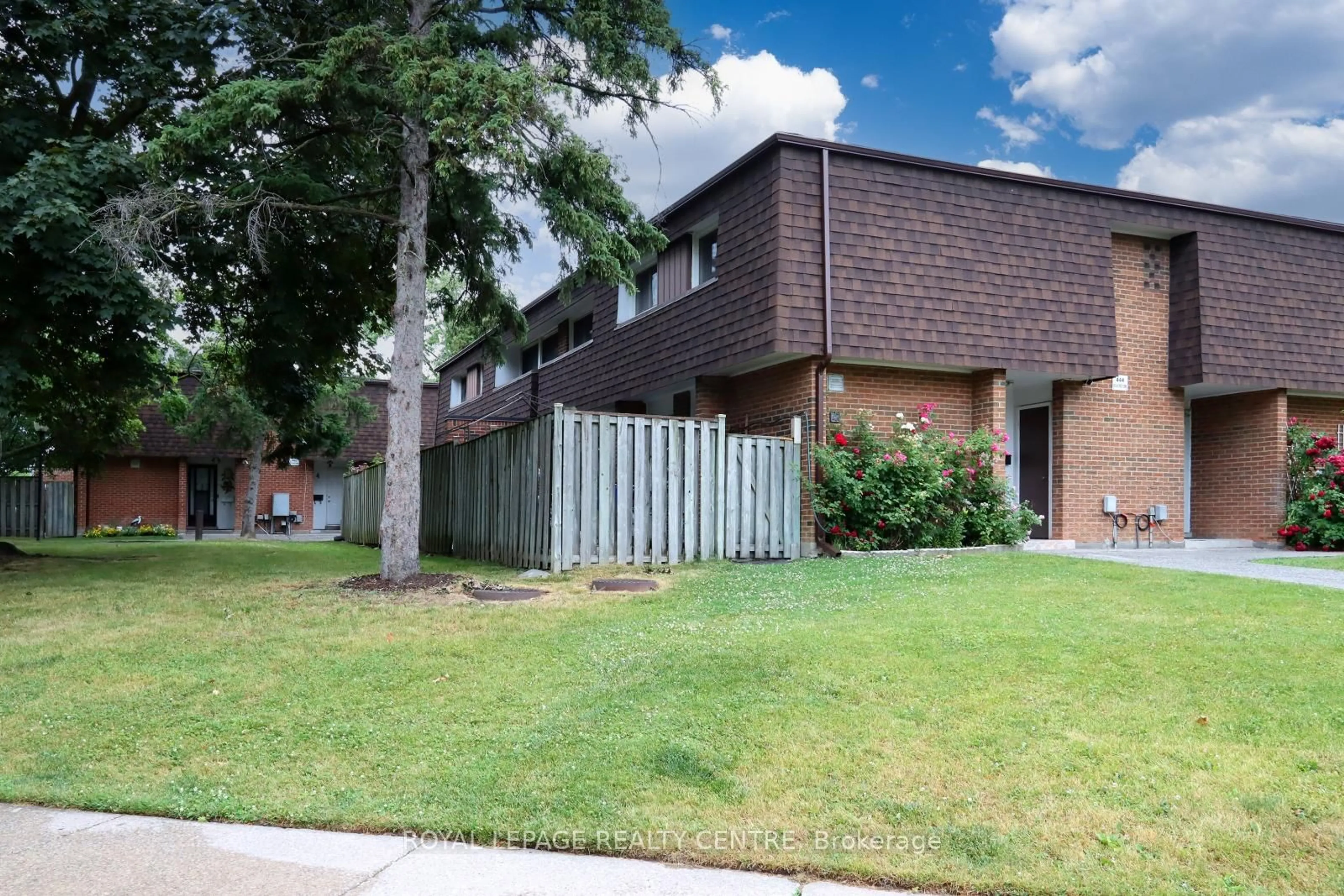 Home with brick exterior material, street for 444 Silverstone Dr #11, Toronto Ontario M9V 3K8