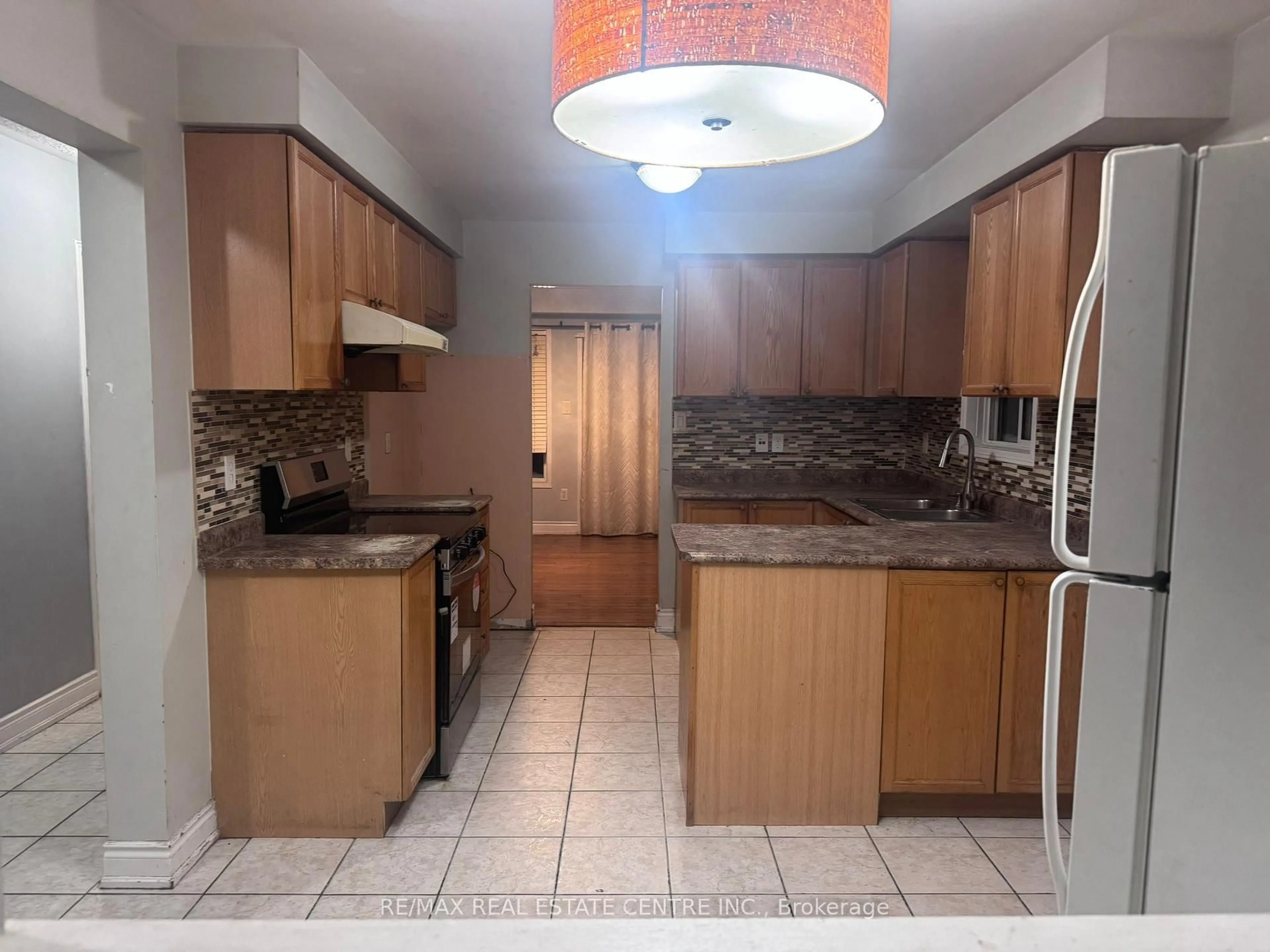 Standard kitchen, ceramic/tile floor for 23 Lonestar Cres, Brampton Ontario L7A 2H9