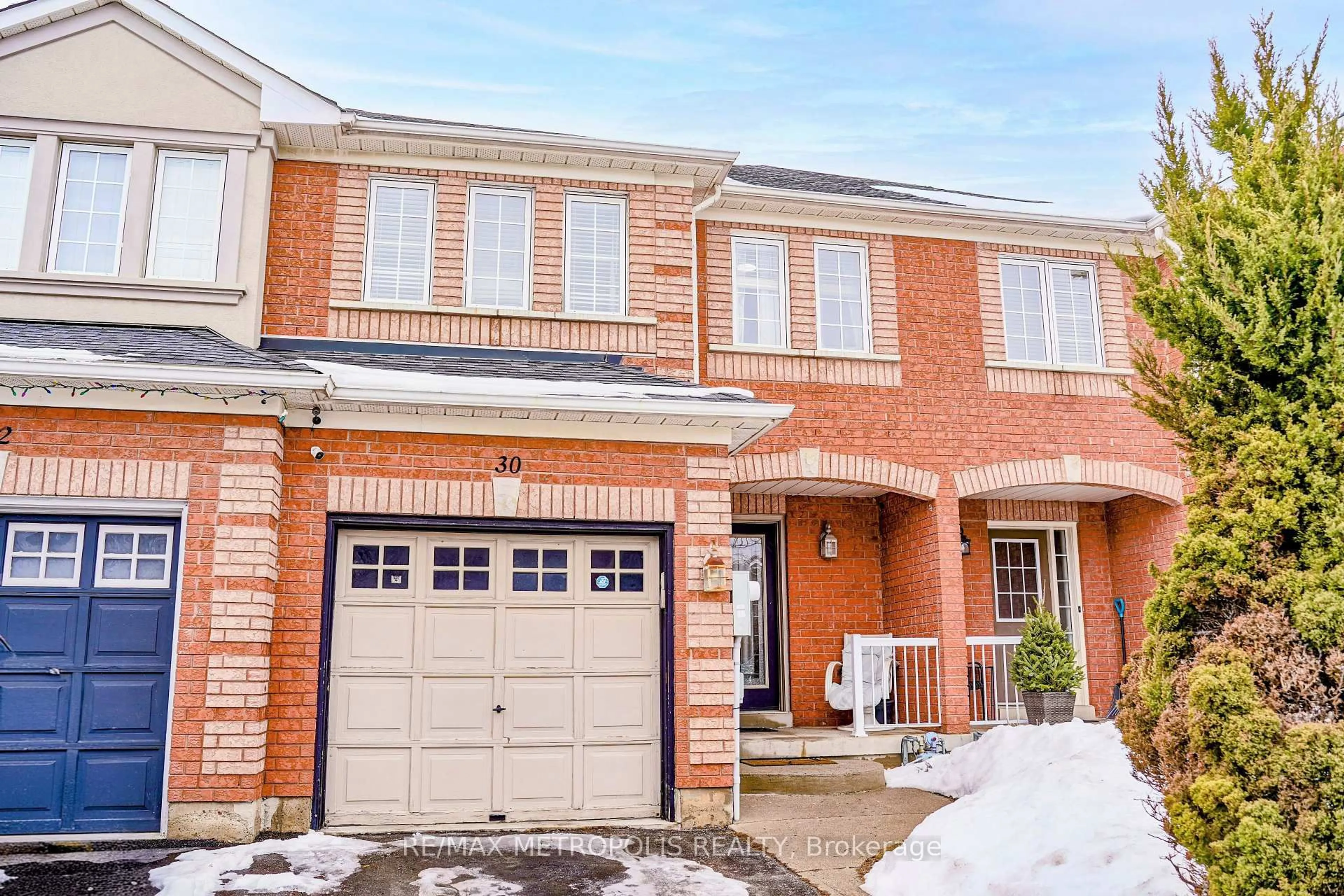 Home with brick exterior material, street for 30 Todmorden Dr, Brampton Ontario L7A 1M6