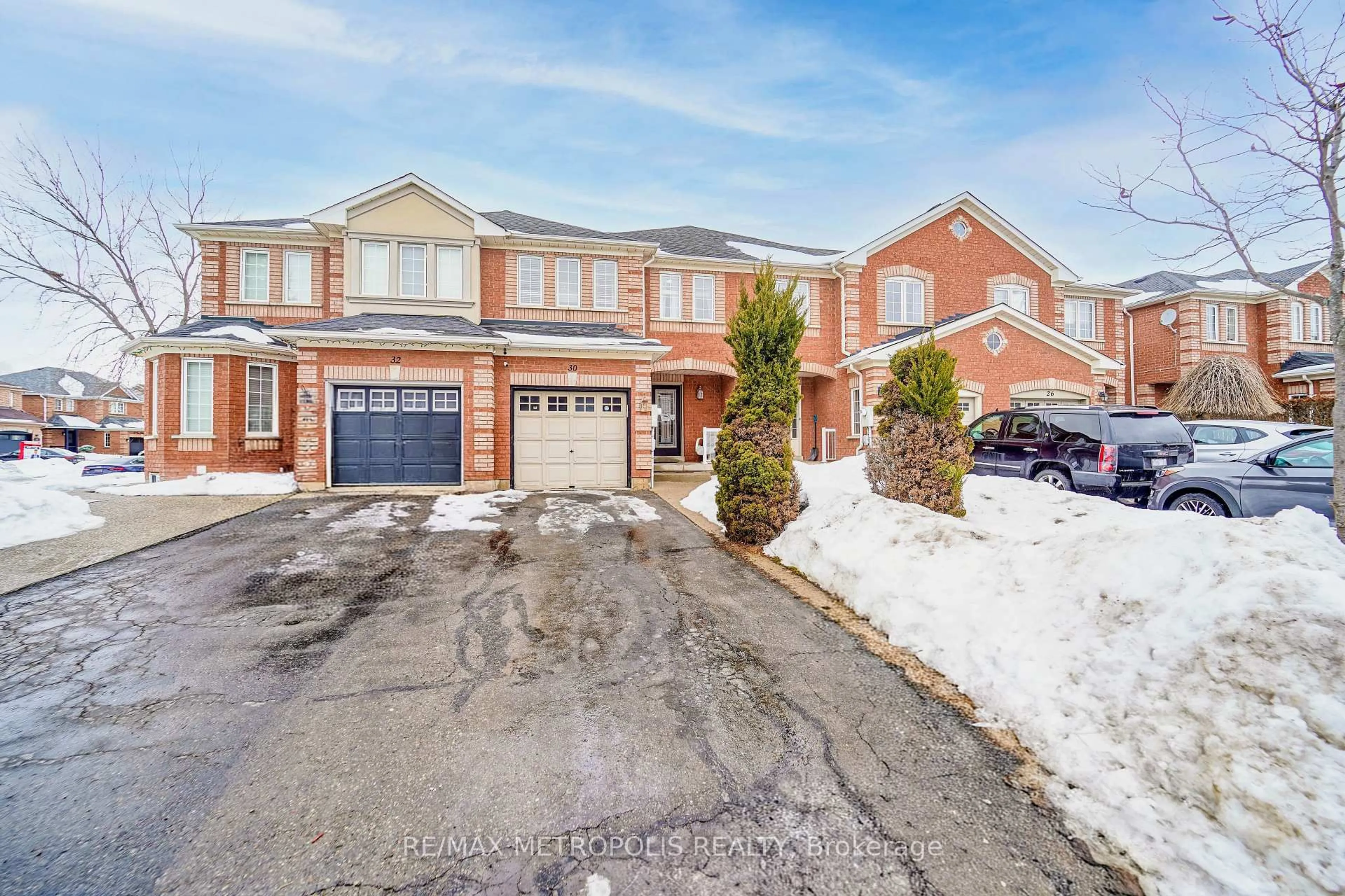 Home with brick exterior material, street for 30 Todmorden Dr, Brampton Ontario L7A 1M6
