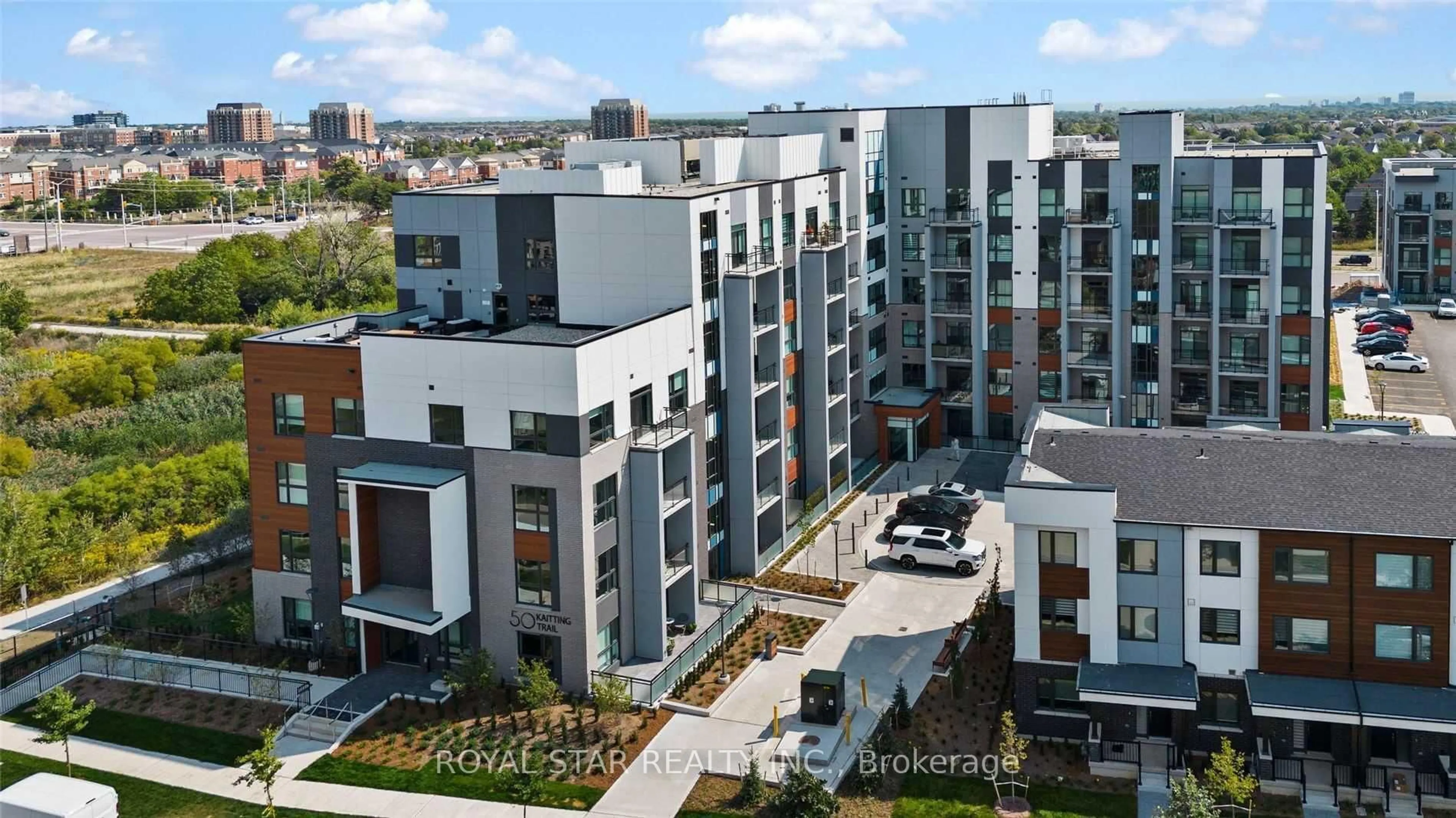 A pic from outside/outdoor area/front of a property/back of a property/a pic from drone, city buildings view from balcony for 50 Kaitting Tr #313, Oakville Ontario L6M 5N3