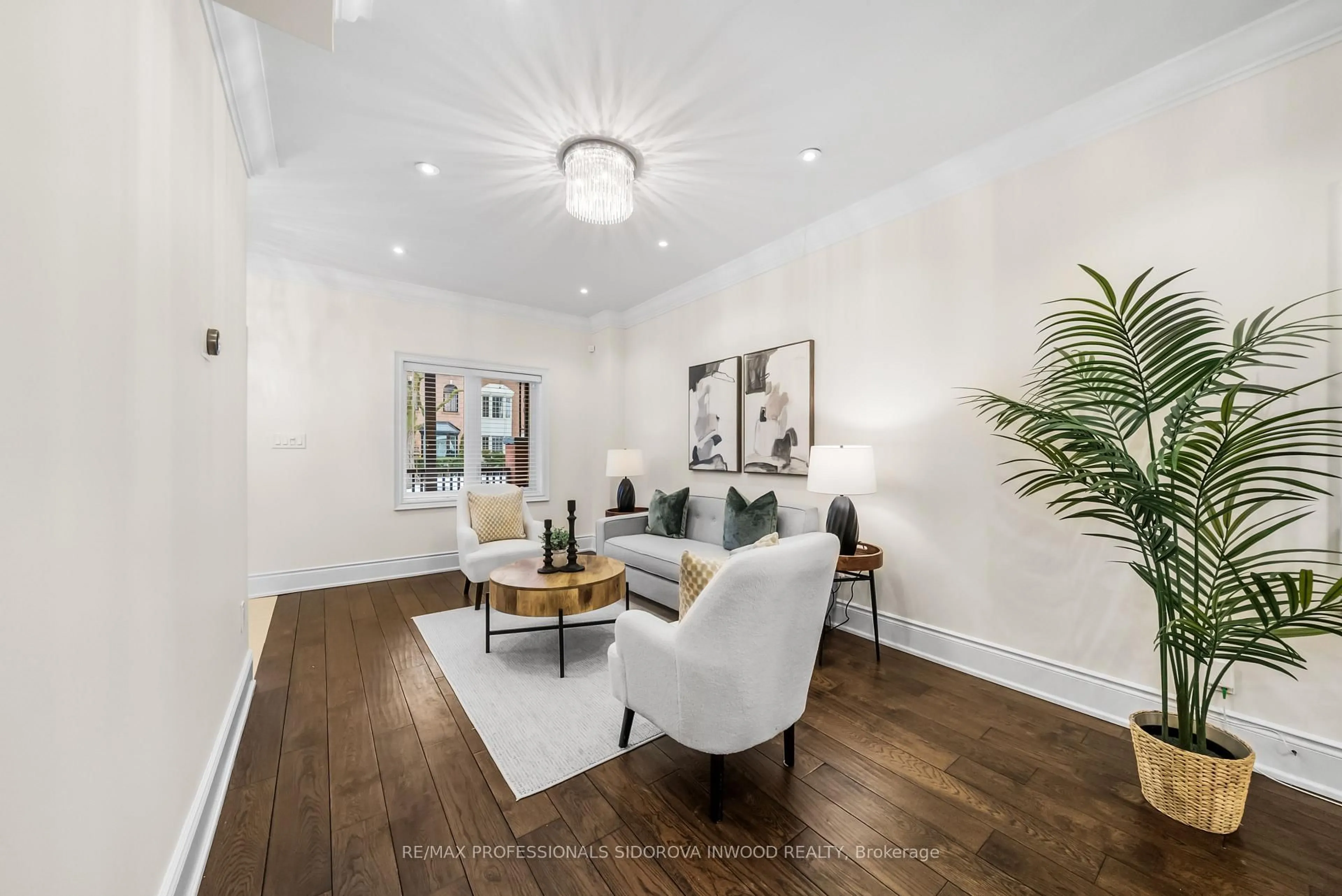 Living room with furniture, wood/laminate floor for 441 Pacific Ave, Toronto Ontario M6P 2R3