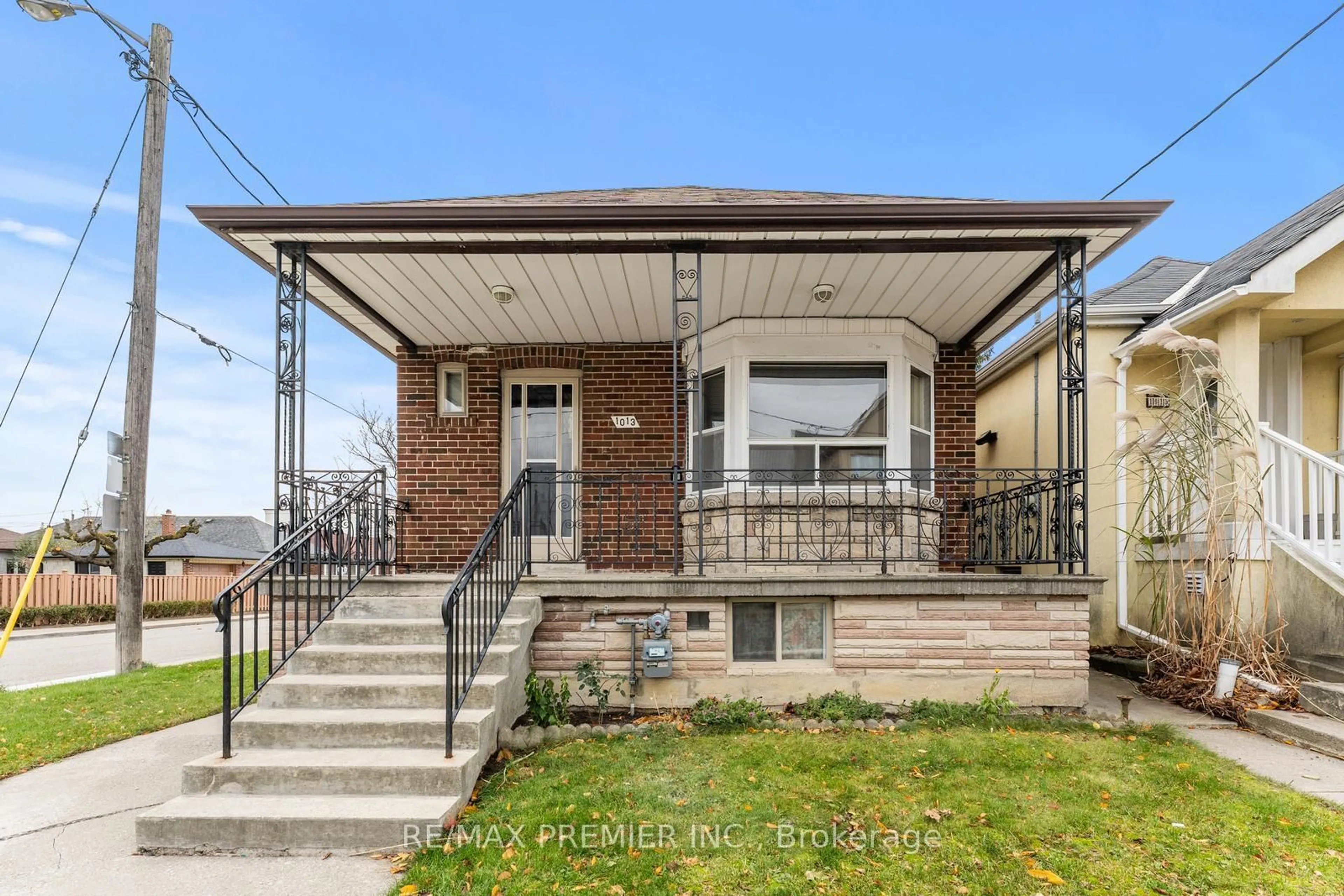 Home with brick exterior material, street for 1013 Briar Hill Ave, Toronto Ontario M6B 1M6