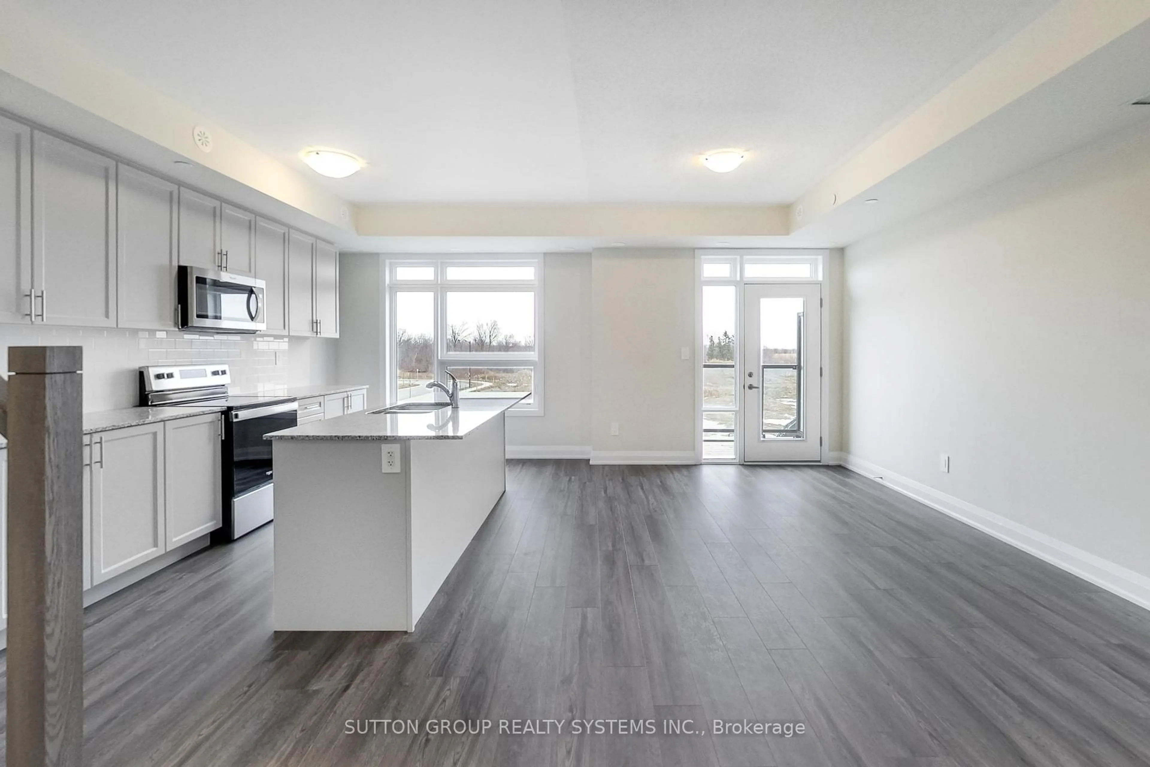 Open concept kitchen, unknown for 1573 Rose Way #109, Milton Ontario L9E 0J2