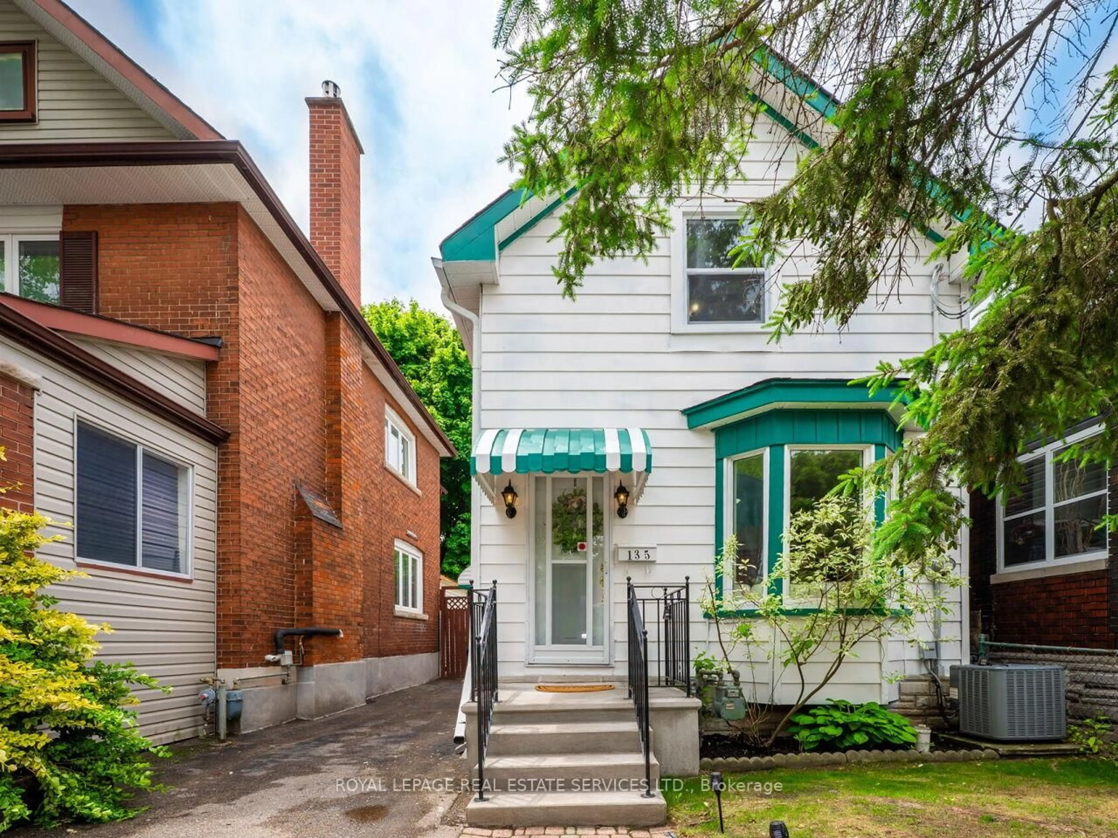 Home with brick exterior material, street for 135 Bernice Cres, Toronto Ontario M6N 1X3