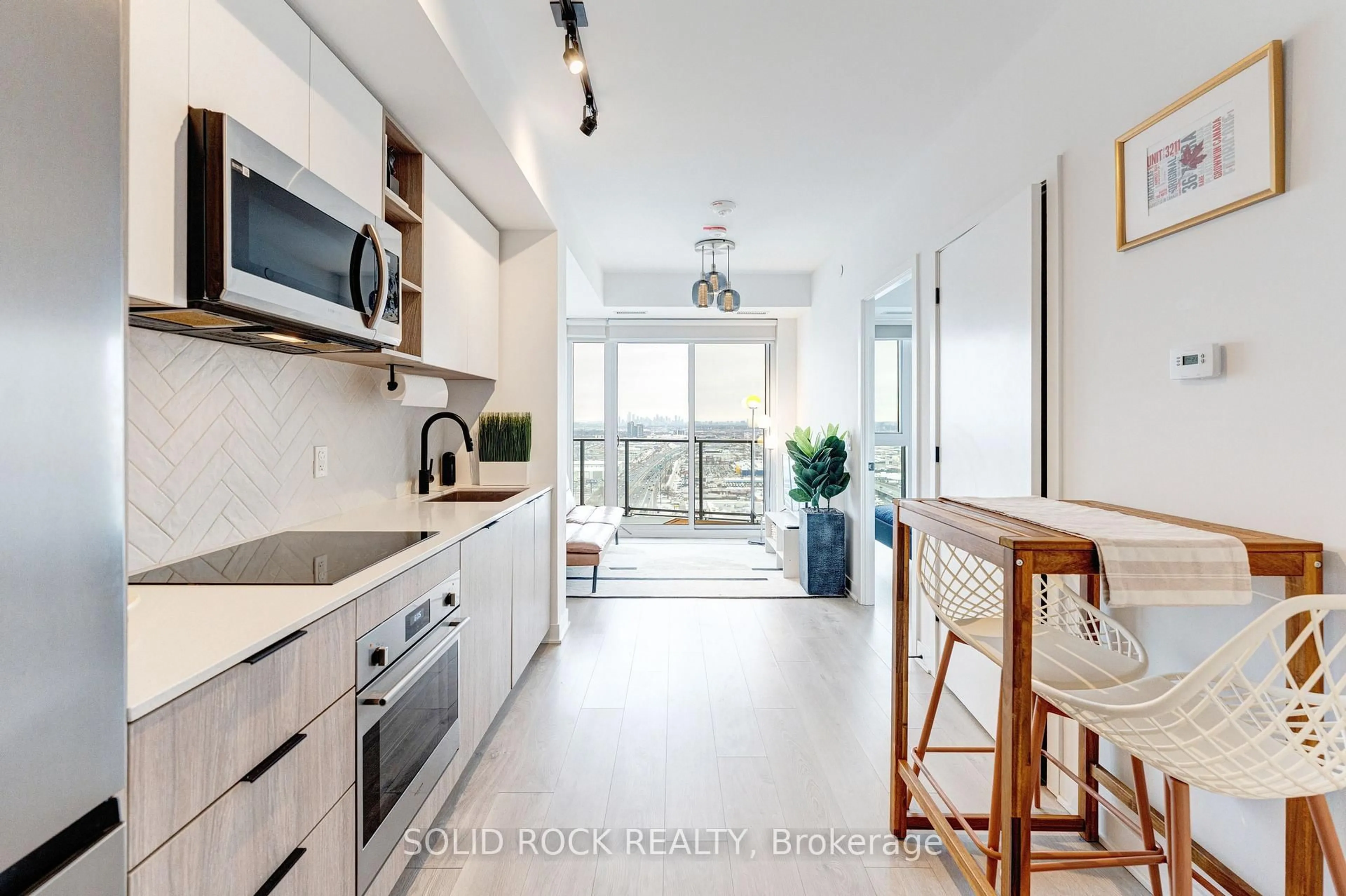 Open concept kitchen, ceramic/tile floor for 36 Zorra St #3211, Toronto Ontario M8Z 0G5