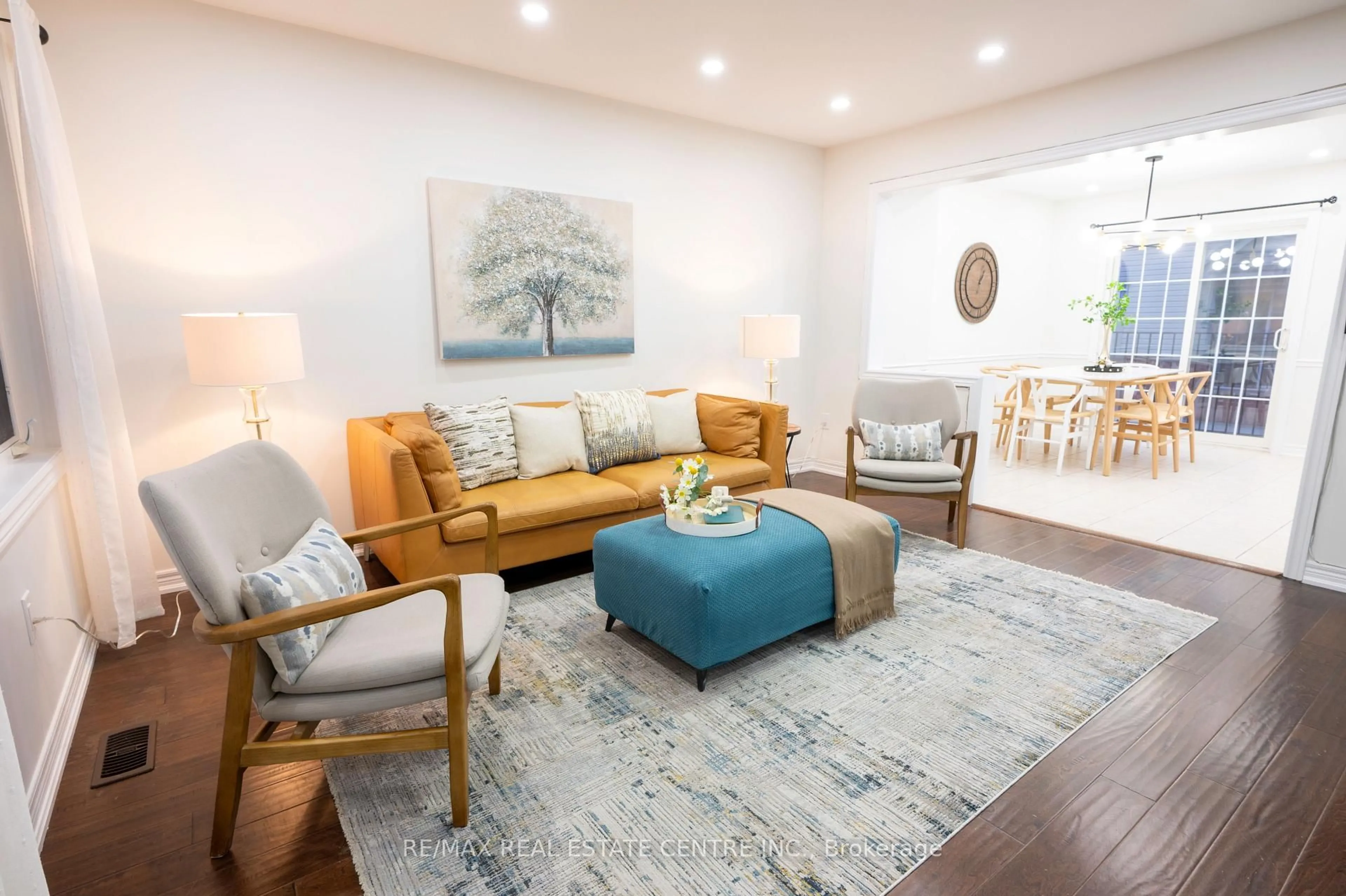 Living room with furniture, wood/laminate floor for 2360 Parkhaven Blvd #4, Oakville Ontario L6H 7S6