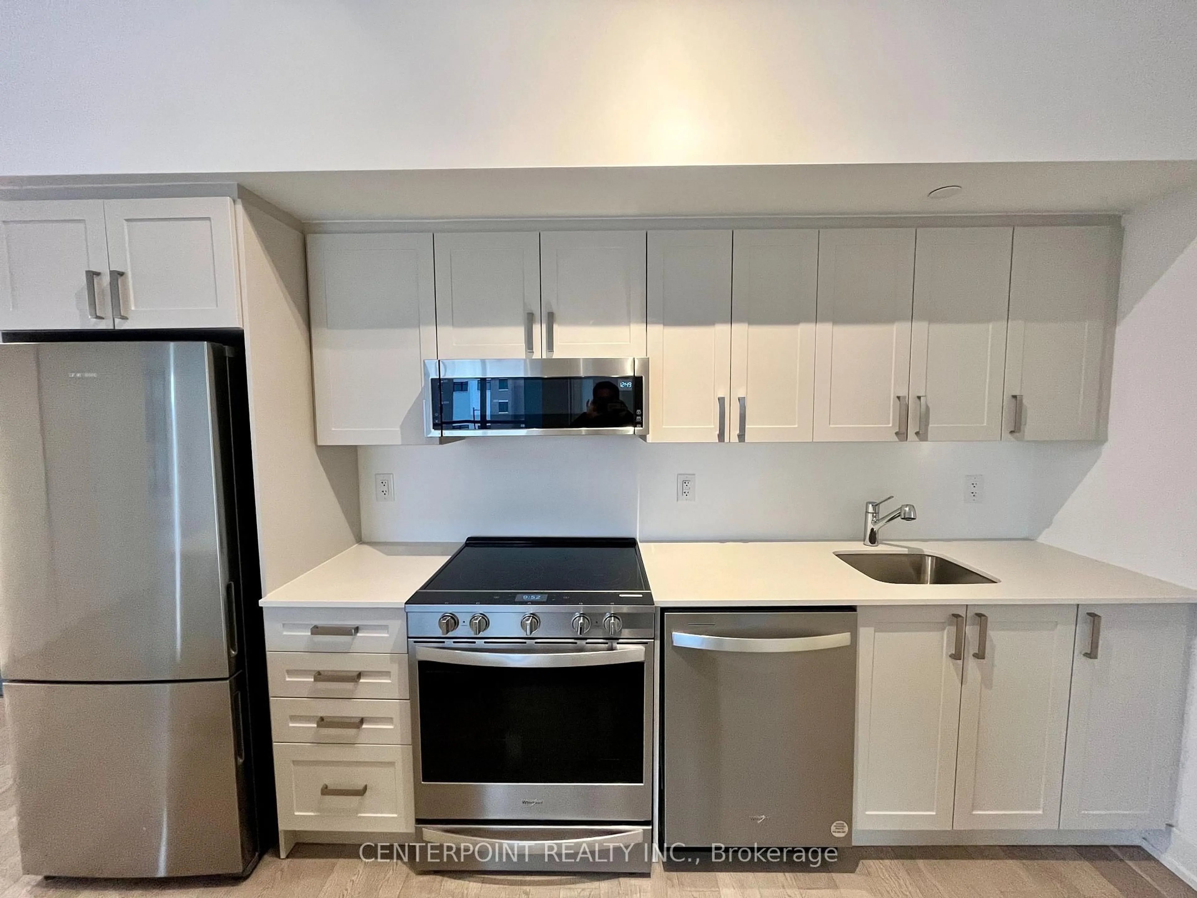 Standard kitchen, ceramic/tile floor for 1063 Douglas Mccurdy Common #201, Mississauga Ontario L5G 0C5