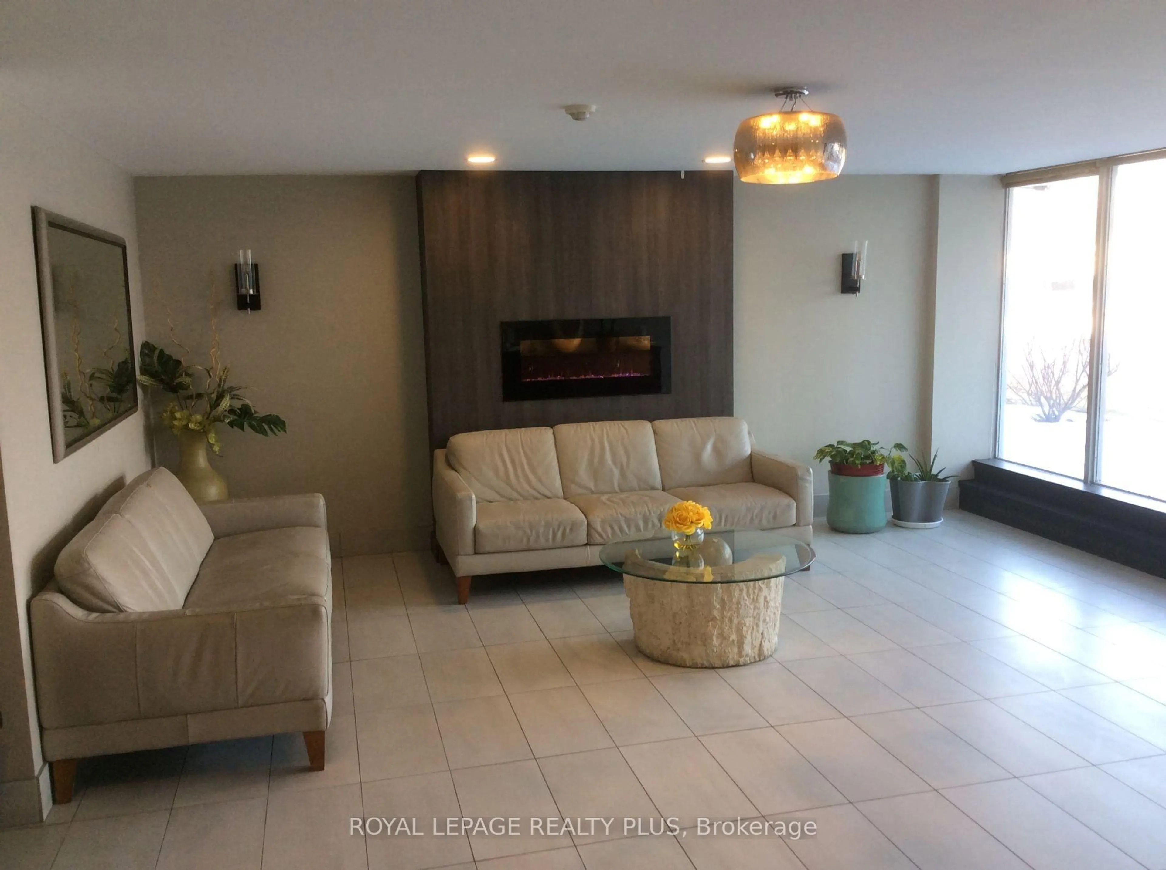 Living room with furniture, unknown for 1100 Caven St #207, Mississauga Ontario L5G 4N3