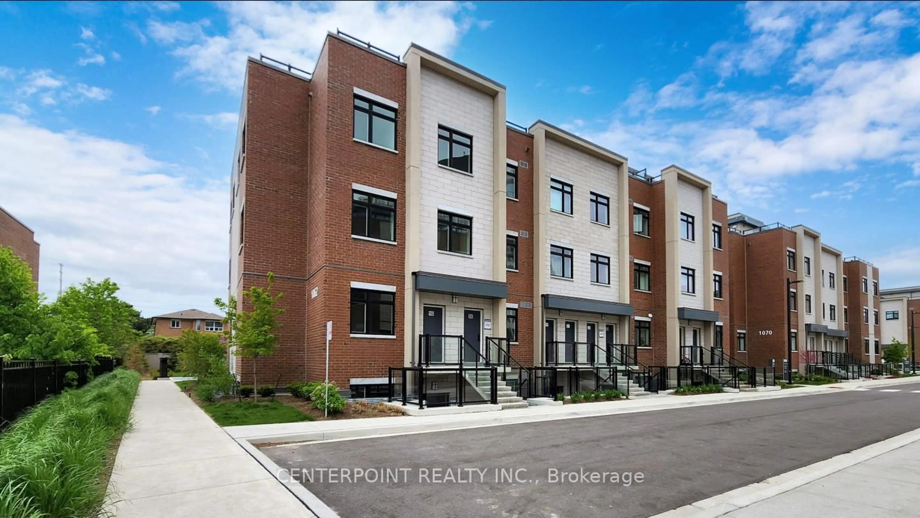 Home with brick exterior material, street for 1062 Douglas Mccurdy Common #232, Mississauga Ontario L5G 0C6