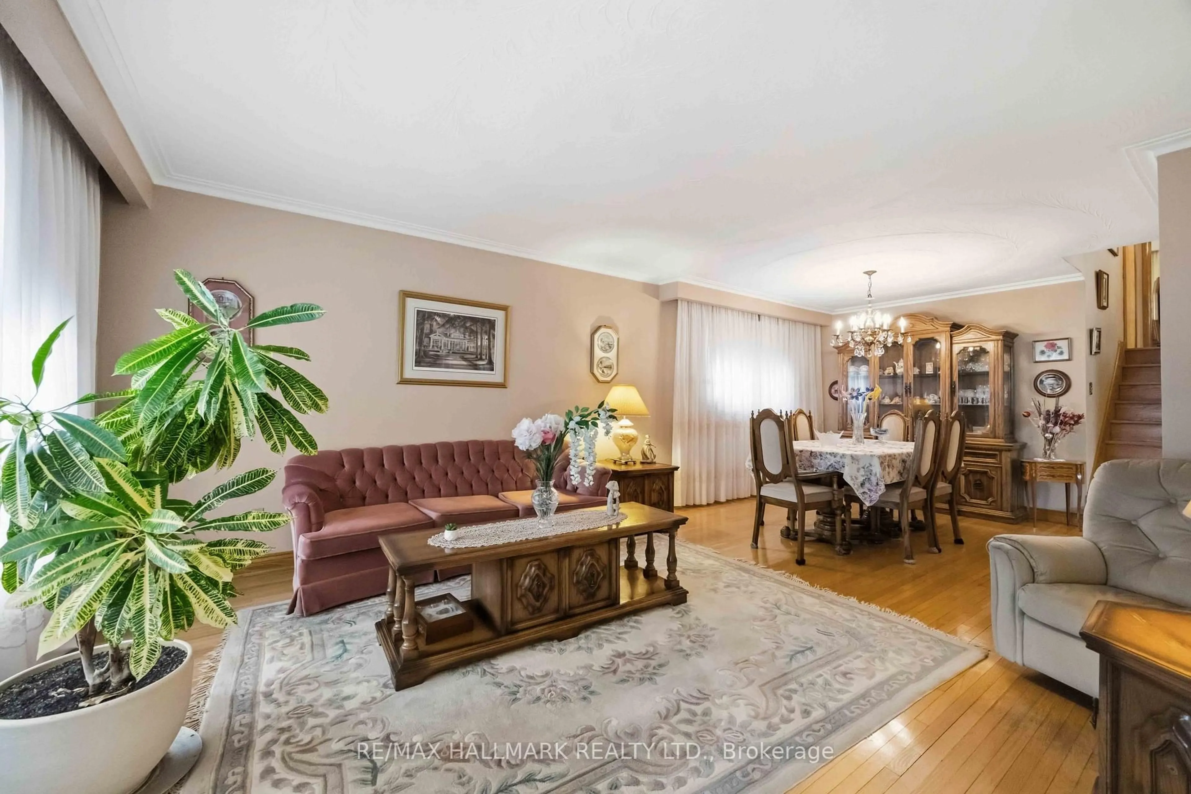 Living room with furniture, wood/laminate floor for 47 Paulvale Cres, Toronto Ontario M3J 1K4