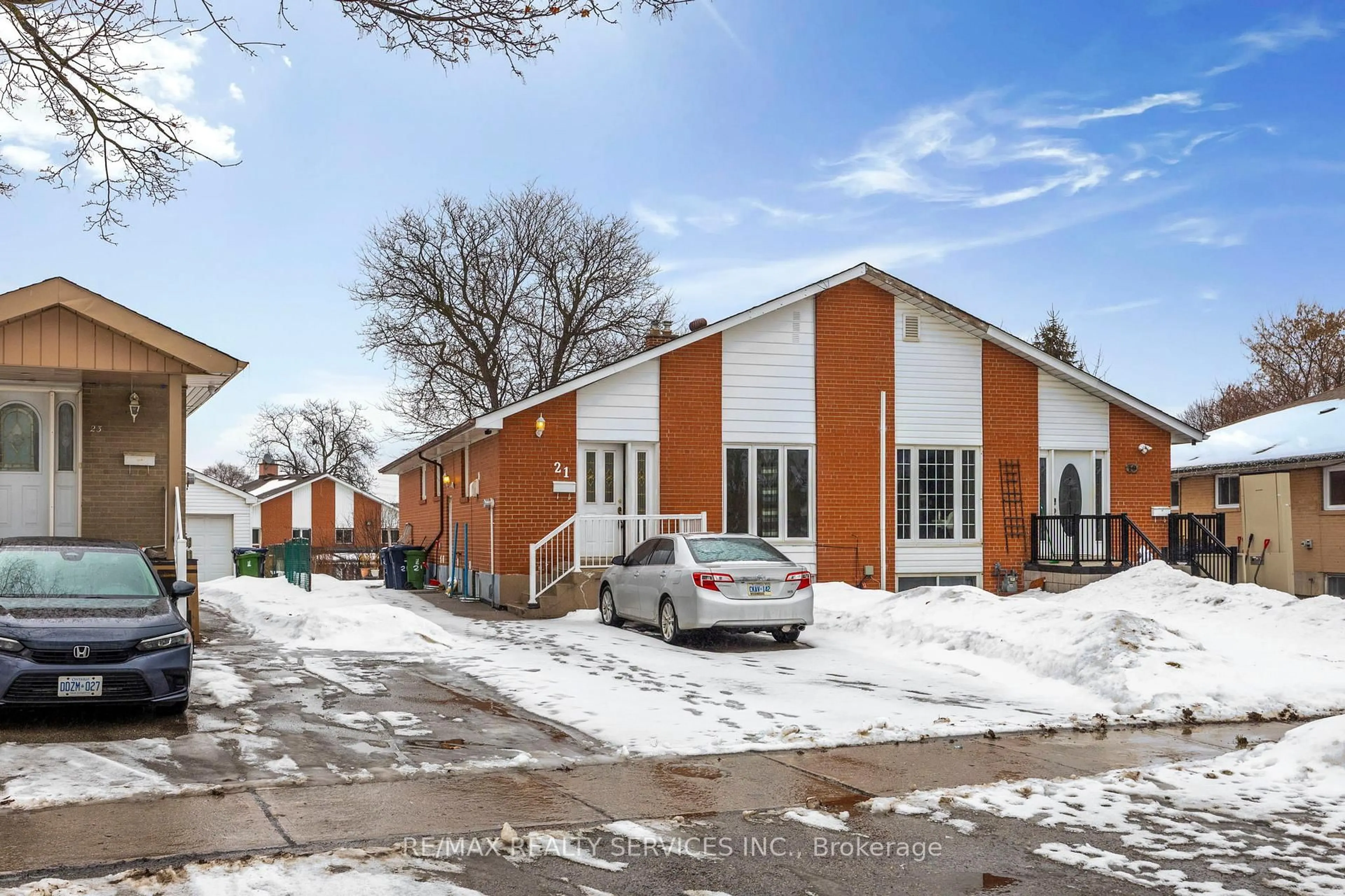 Home with brick exterior material, street for 21 Radwinter Dr, Toronto Ontario M9V 1P7