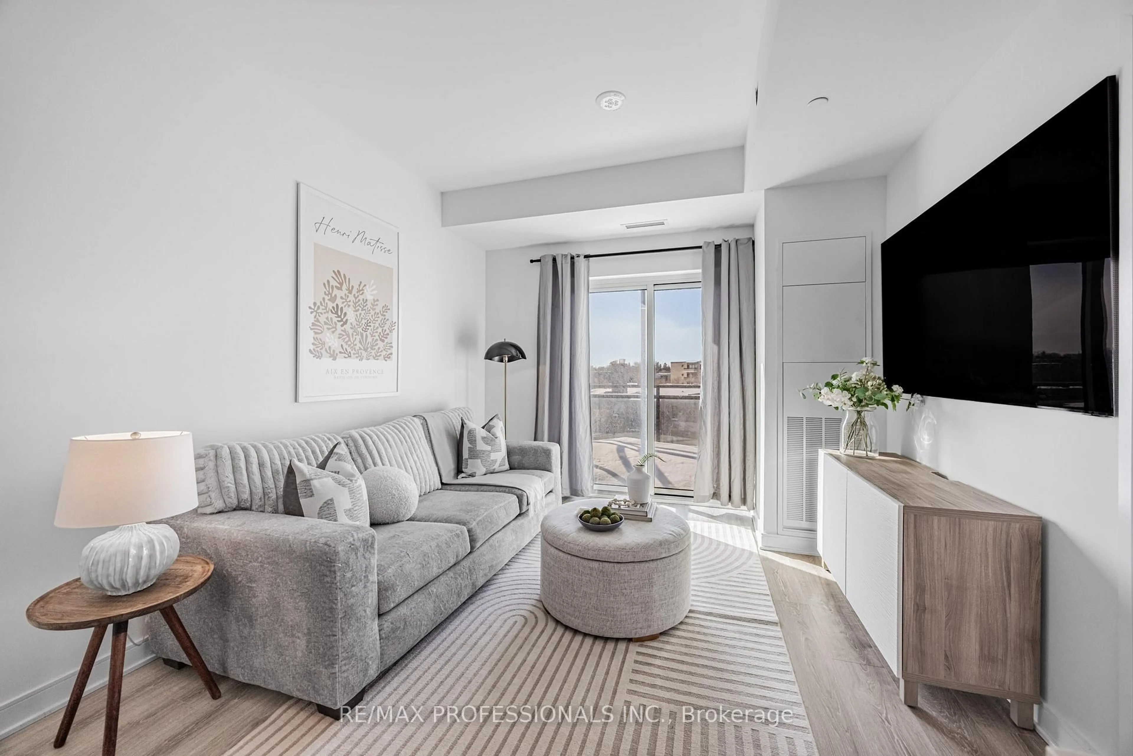 Living room with furniture, unknown for 25 Neighbourhood Lane #906, Toronto Ontario M8Y 0C4