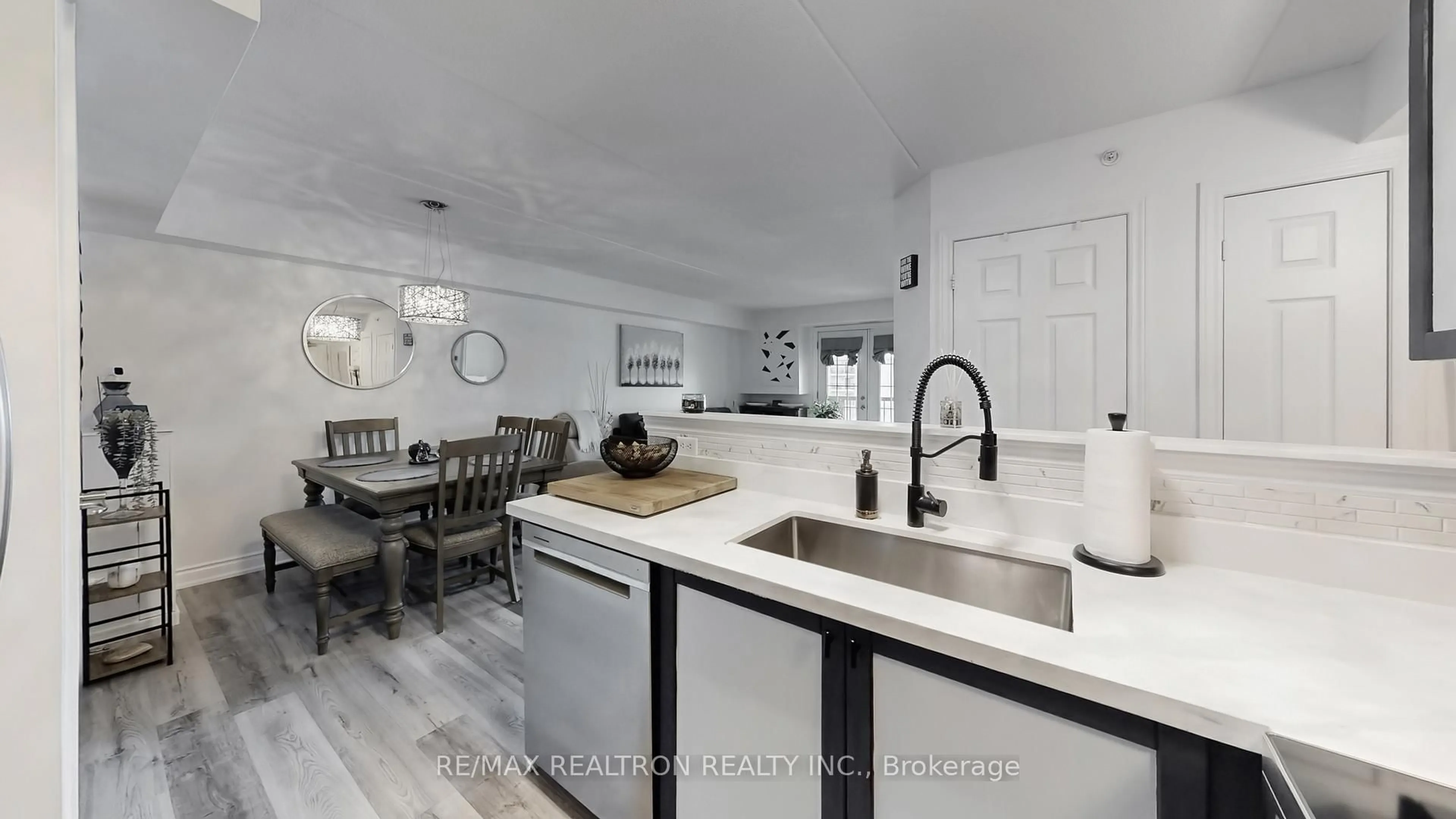 Open concept kitchen, ceramic/tile floor for 1390 Main St #310, Milton Ontario L9T 7S9