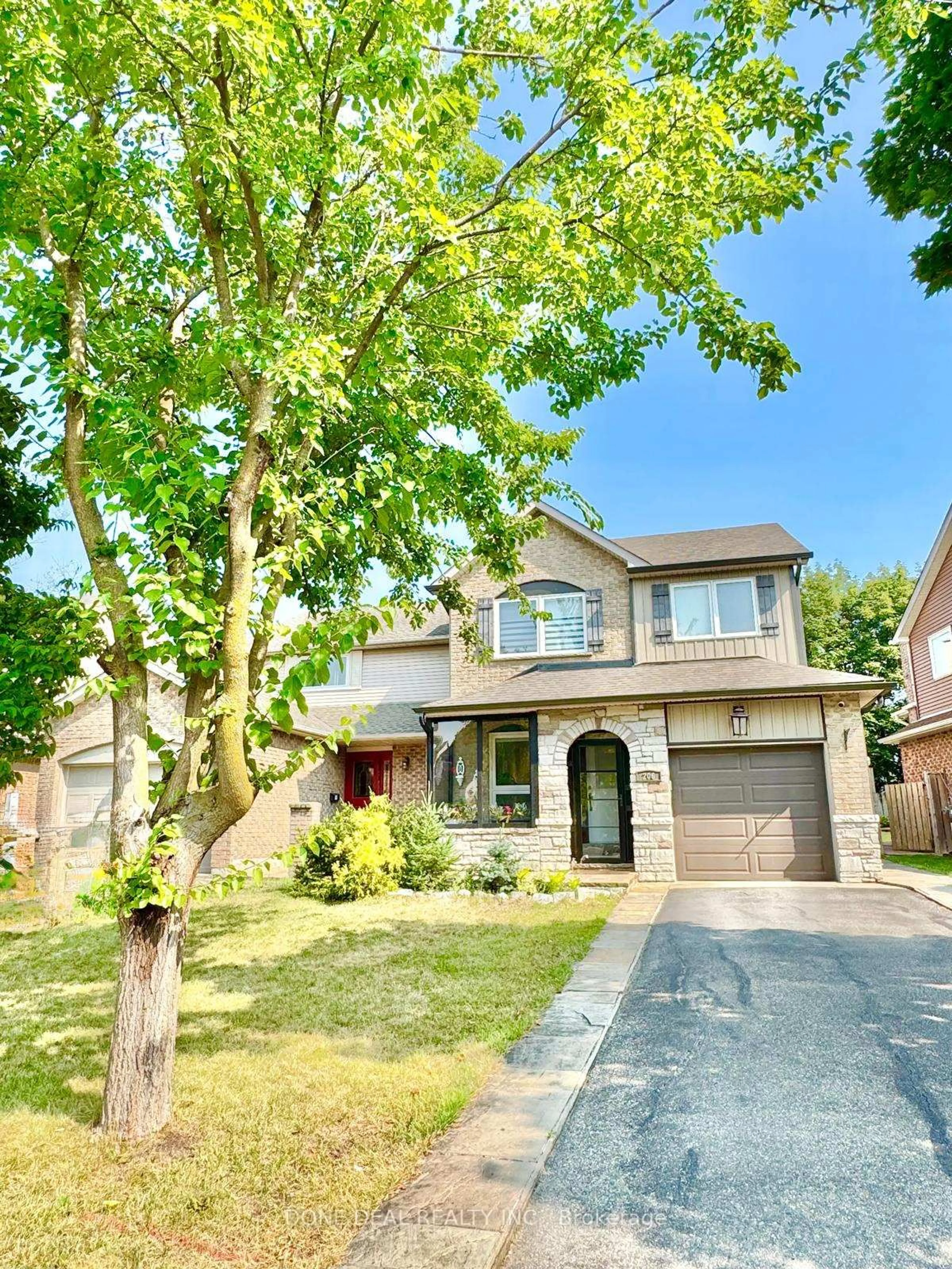 Home with brick exterior material, street for 206 Harvest Dr, Milton Ontario L9T 4T3