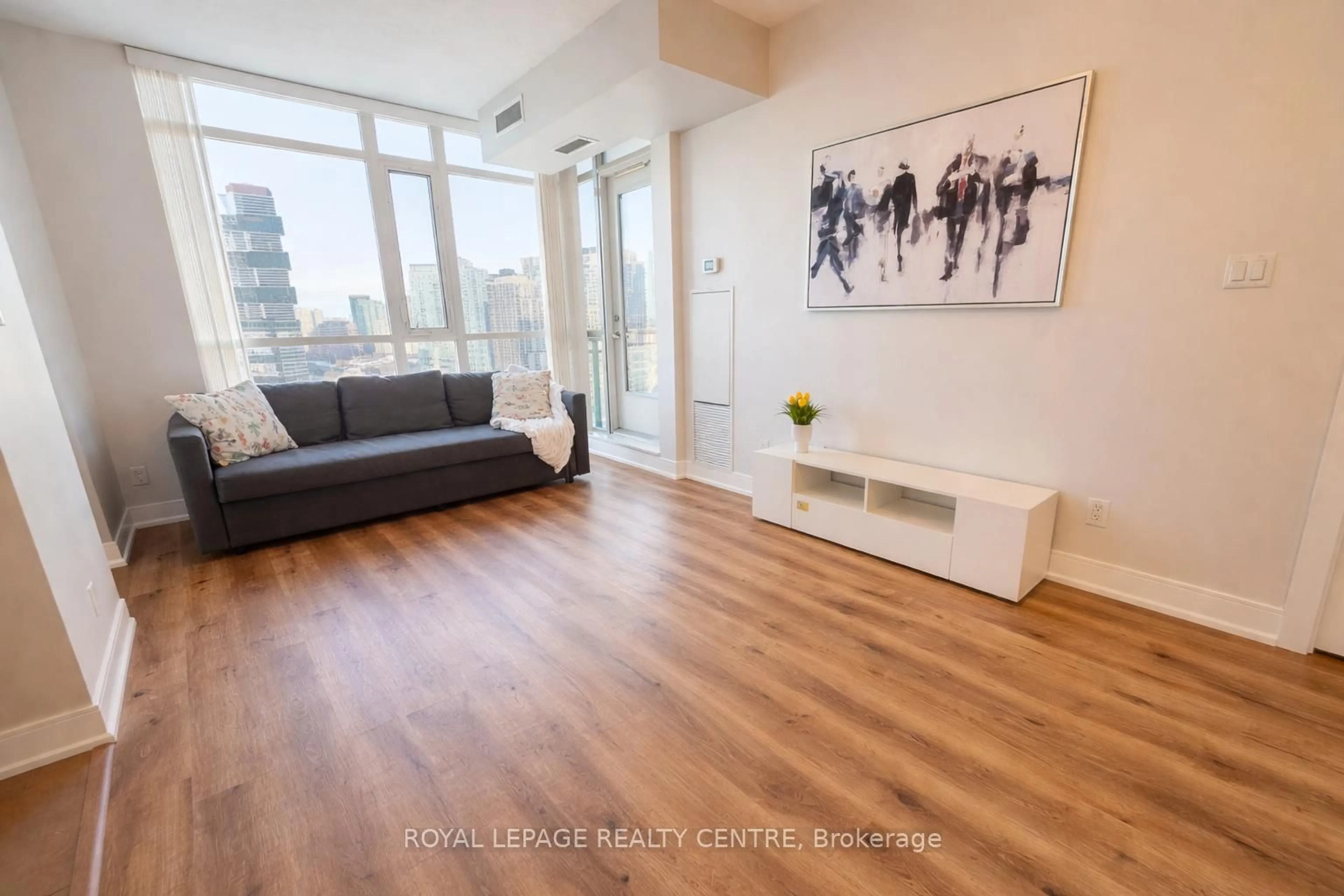 Living room with furniture, wood/laminate floor for 4065 Brickstone Mews Rd #2008, Mississauga Ontario L5B 0G3