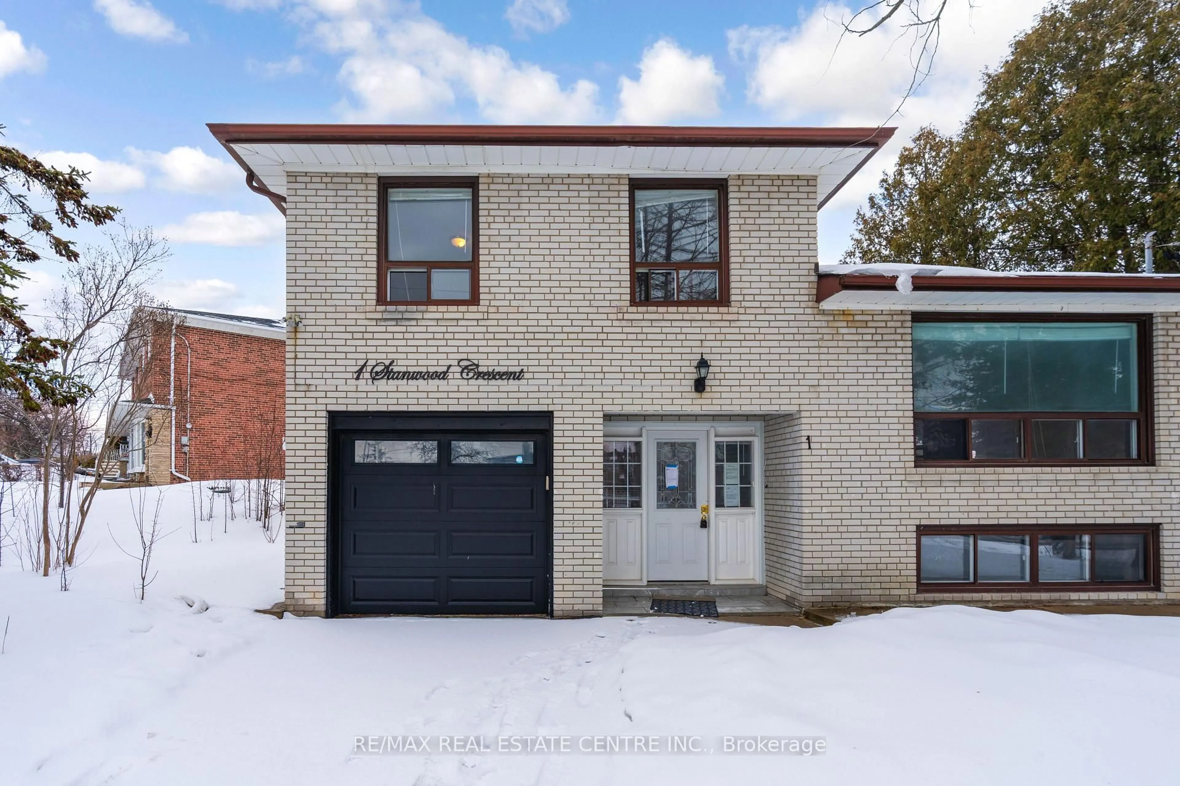 Home with brick exterior material, street for 1 Stanwood Cres, Toronto Ontario M9M 1Z8