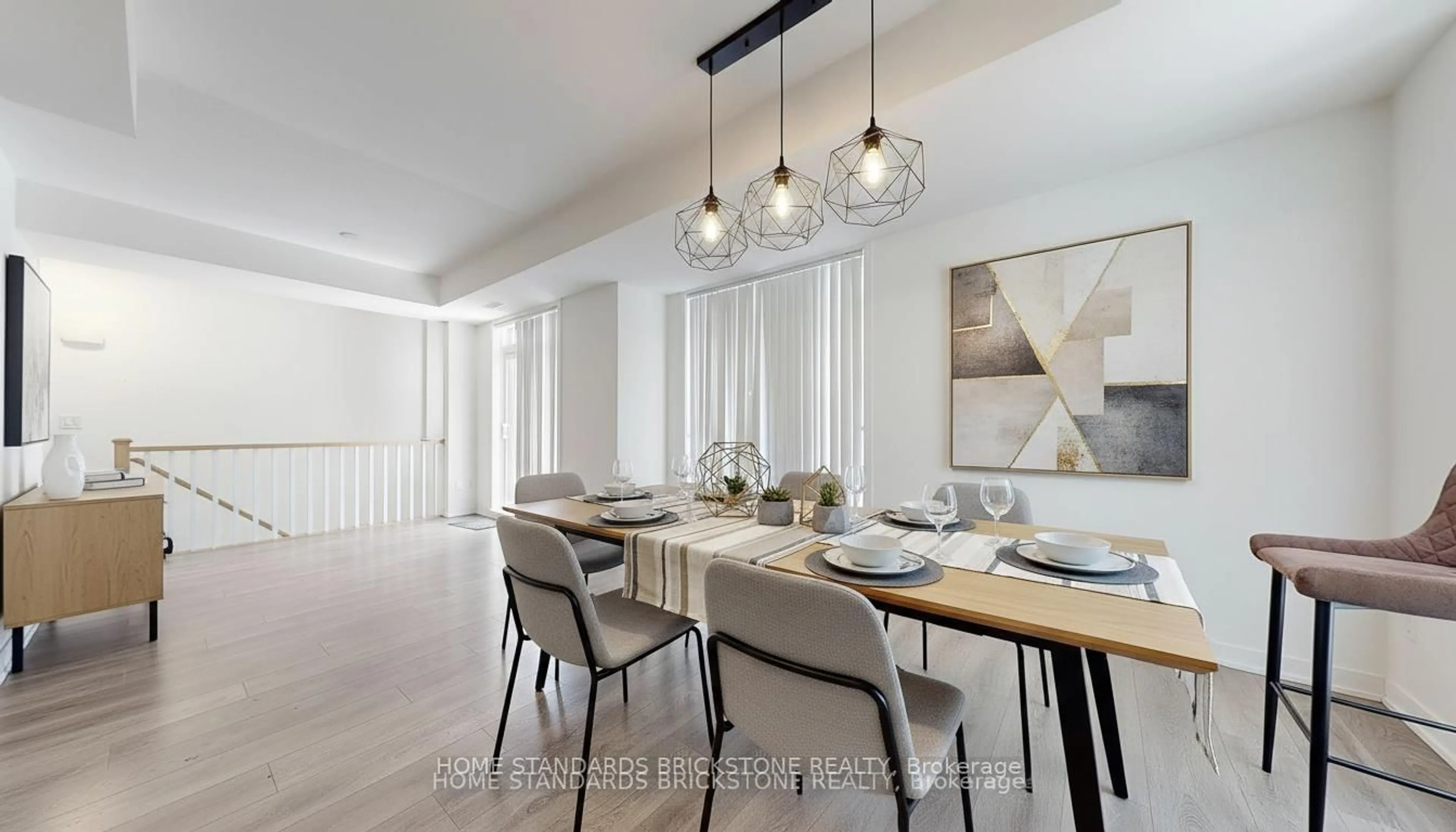 Dining room, wood/laminate floor for 90 canon jackson Dr #H212, Toronto Ontario M6M 0C1