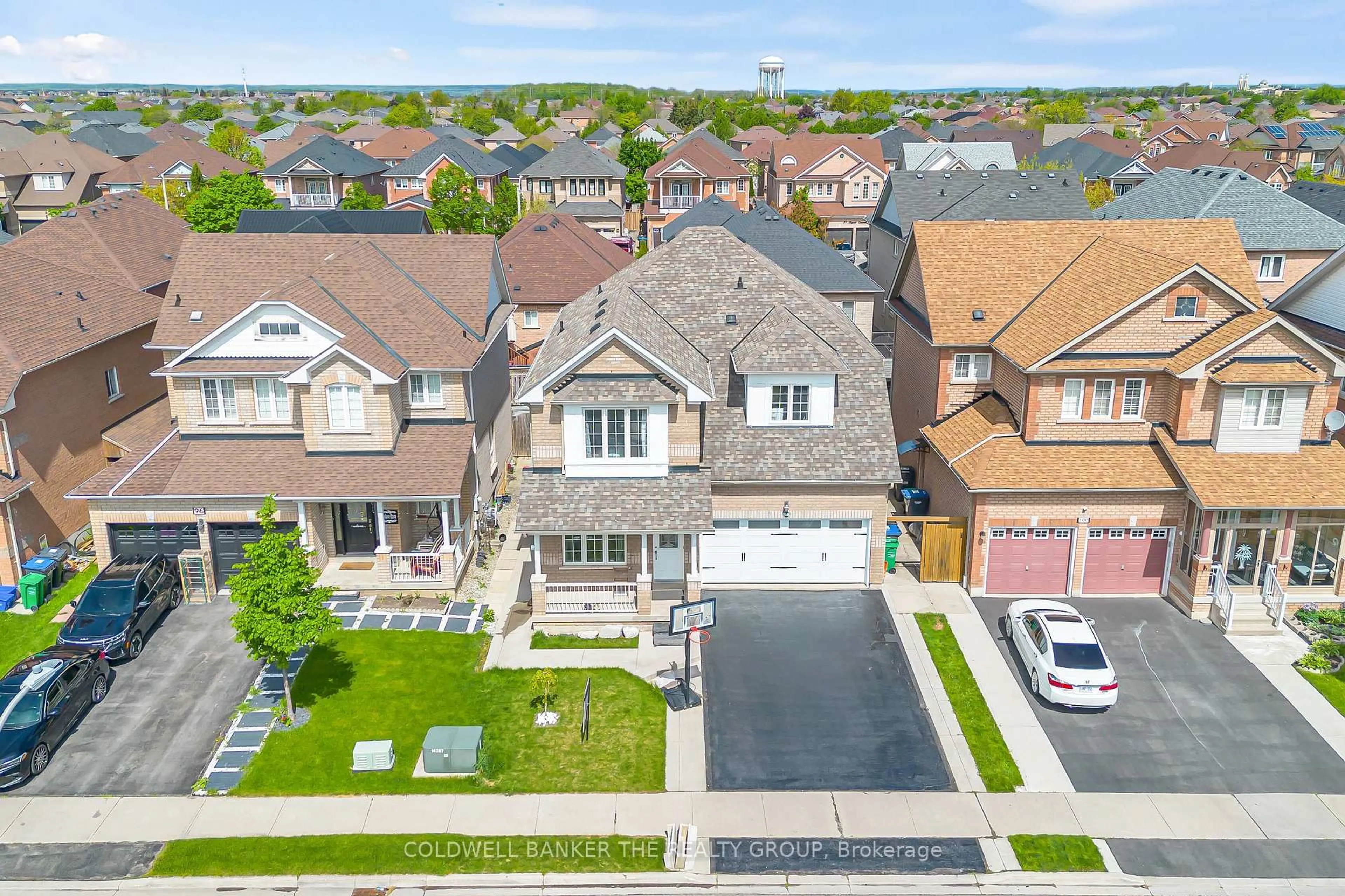 A pic from outside/outdoor area/front of a property/back of a property/a pic from drone, street for 98 Masters Green Cres, Brampton Ontario L7A 3K5