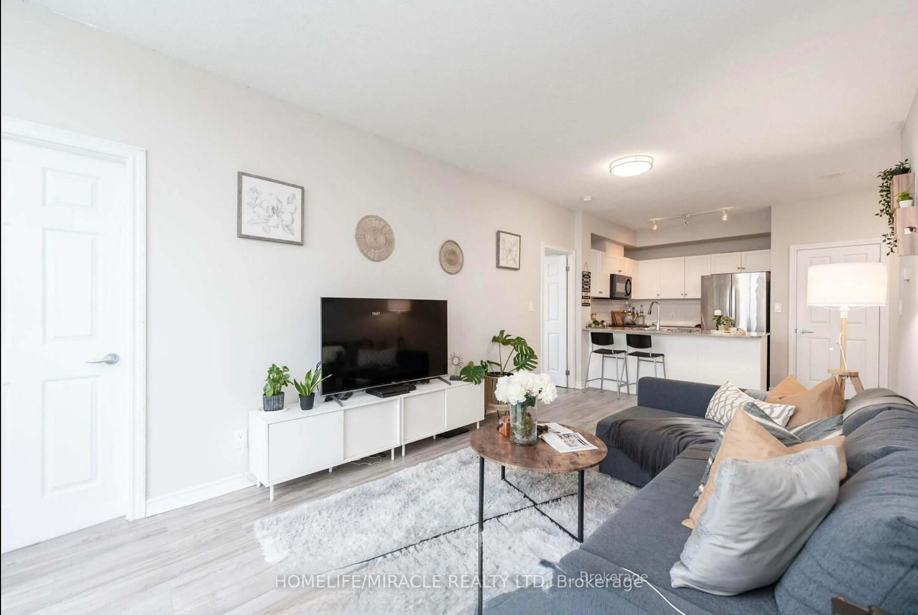 Living room with furniture, unknown for 3504 Hurontario St #1702, Mississauga Ontario L5B 0B9