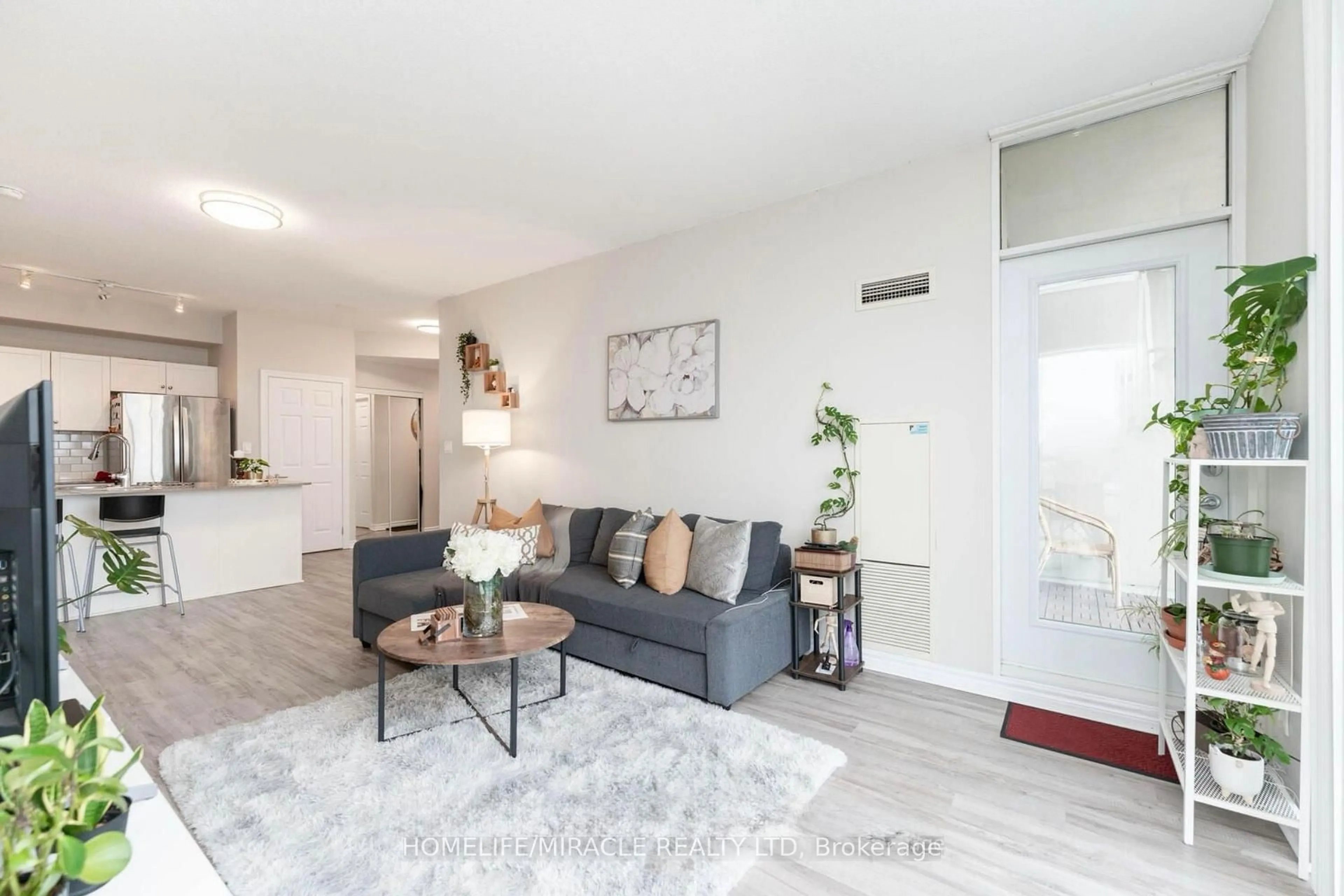 Living room with furniture, unknown for 3504 Hurontario St #1702, Mississauga Ontario L5B 0B9