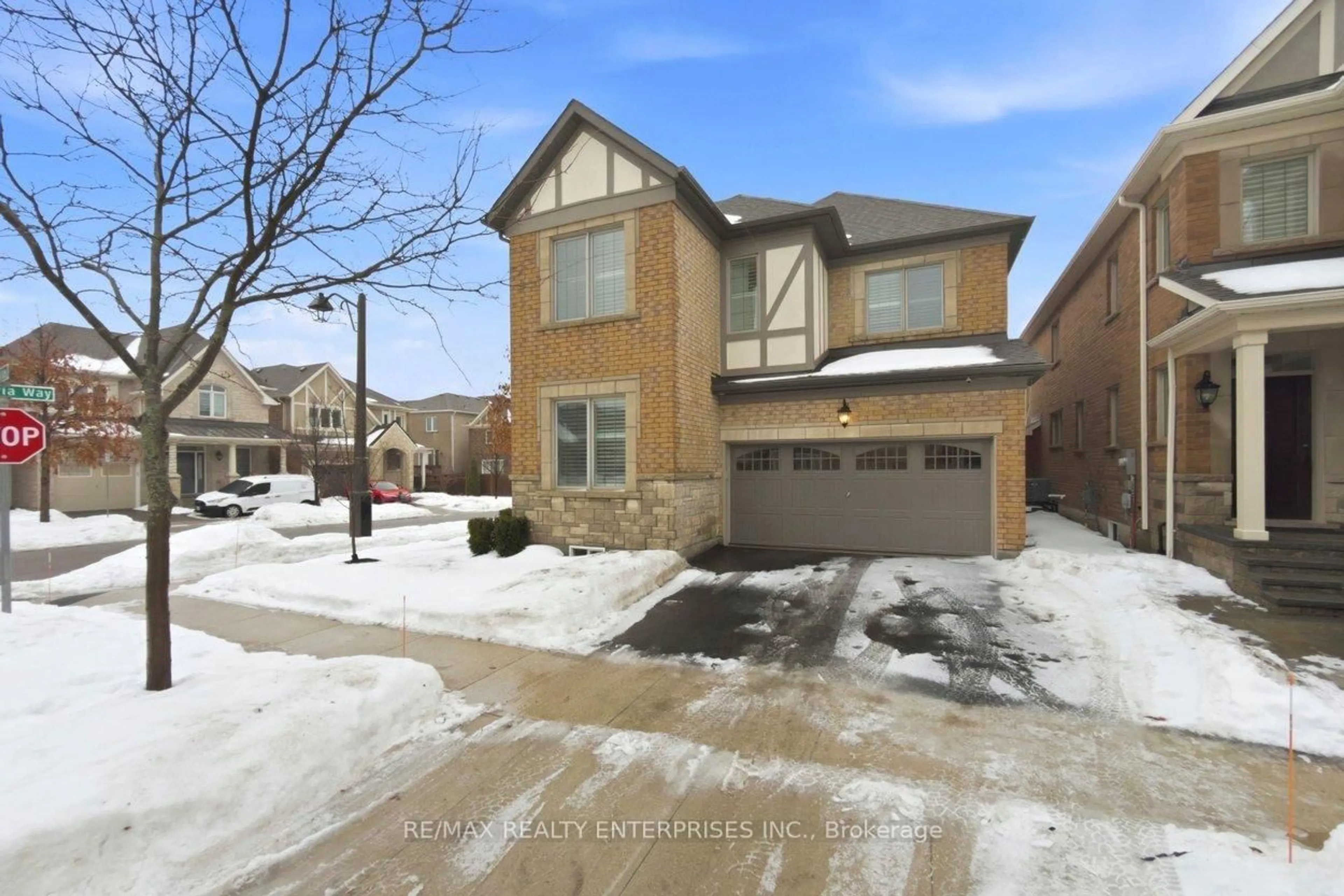 Home with brick exterior material, street for 355 Wisteria Way, Oakville Ontario L6M 1L6