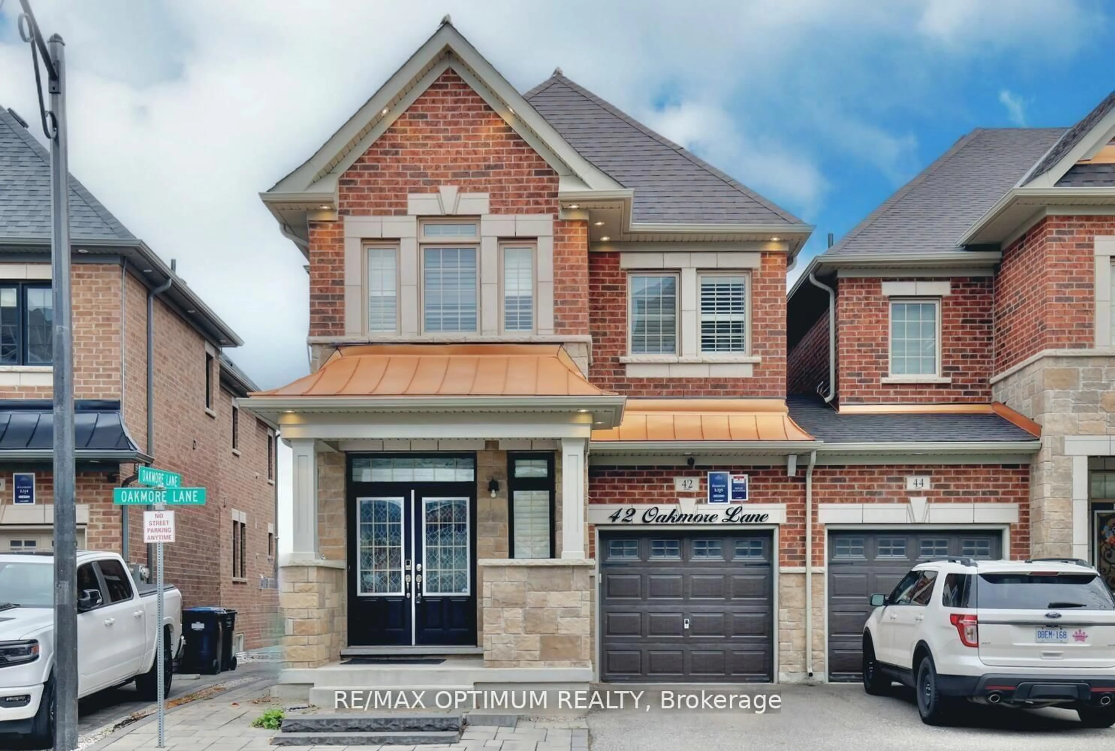 Home with brick exterior material, street for 42 OAKMORE Lane, Brampton Ontario L6Y 6H5