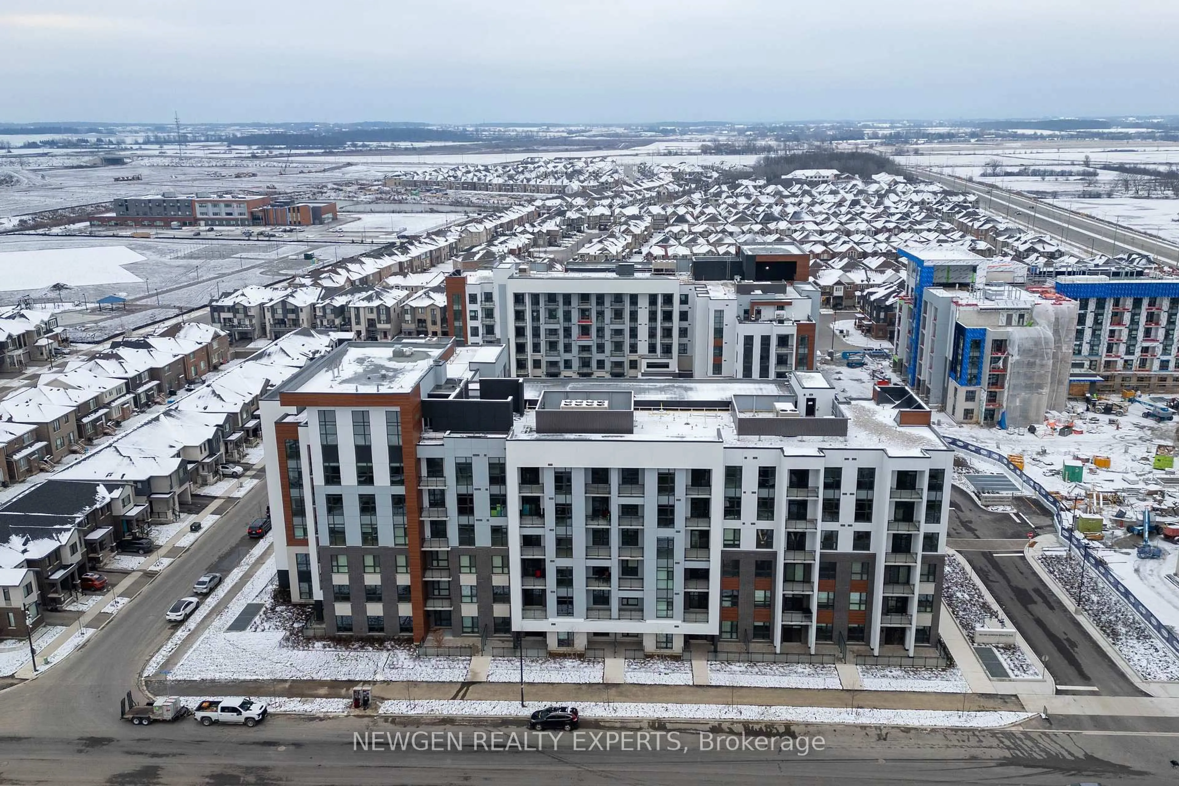 A pic from outside/outdoor area/front of a property/back of a property/a pic from drone, city buildings view from balcony for 460 Gordon Krantz Ave #110, Milton Ontario L9E 1Z2