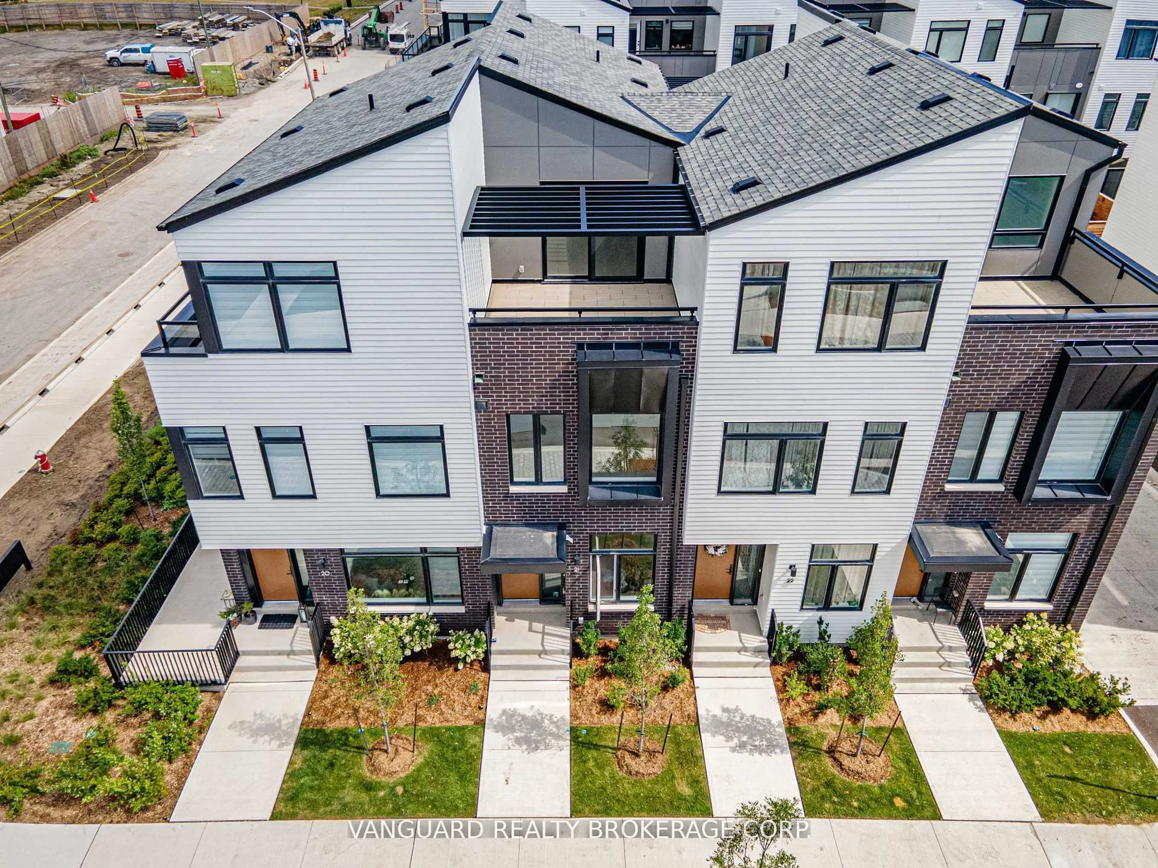 A pic from outside/outdoor area/front of a property/back of a property/a pic from drone, mountain view for 15 Lou Parsons Way #21, Mississauga Ontario L5H 0B2