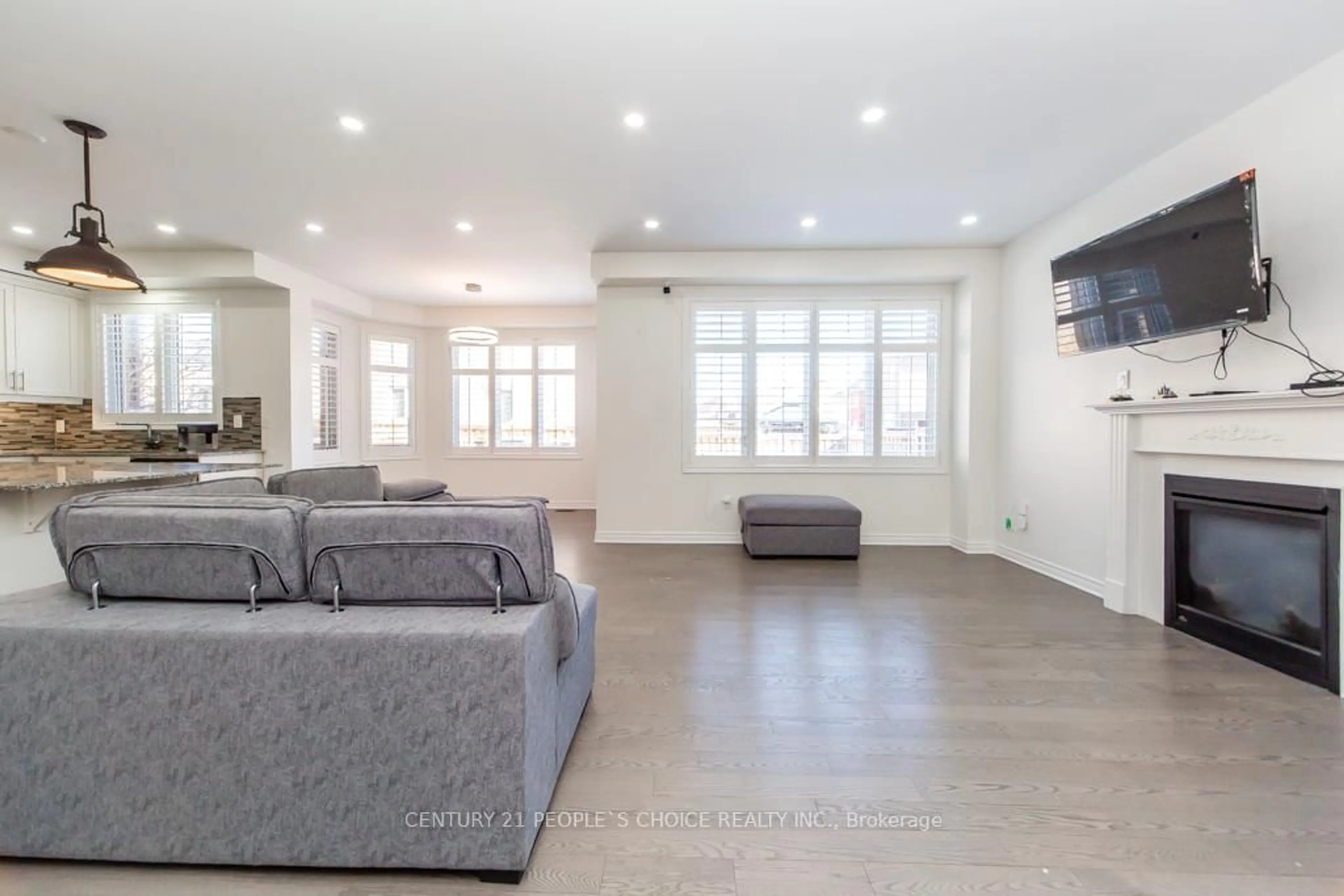 Living room with furniture, unknown for 57 Aldersgate Dr, Brampton Ontario L7A 3Z9