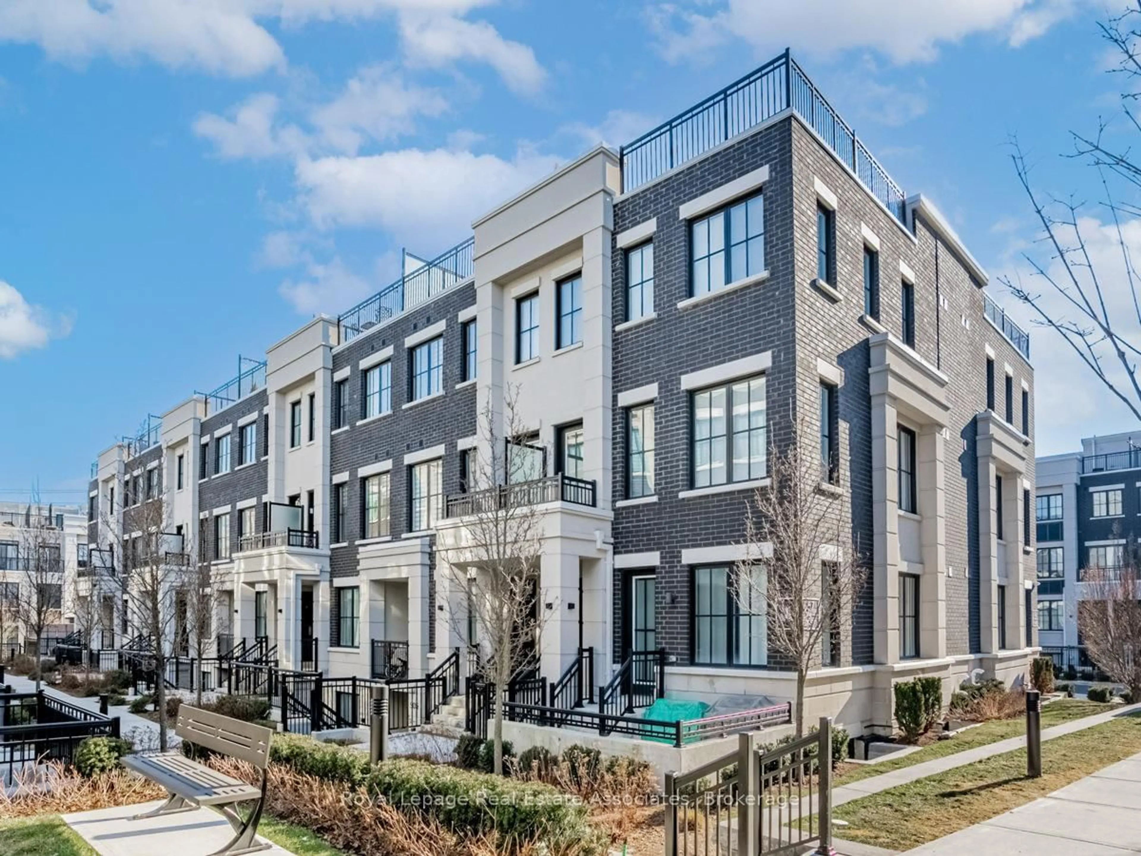 Home with brick exterior material, street for 657 Cricklewood Dr #511, Mississauga Ontario L5G 0B8