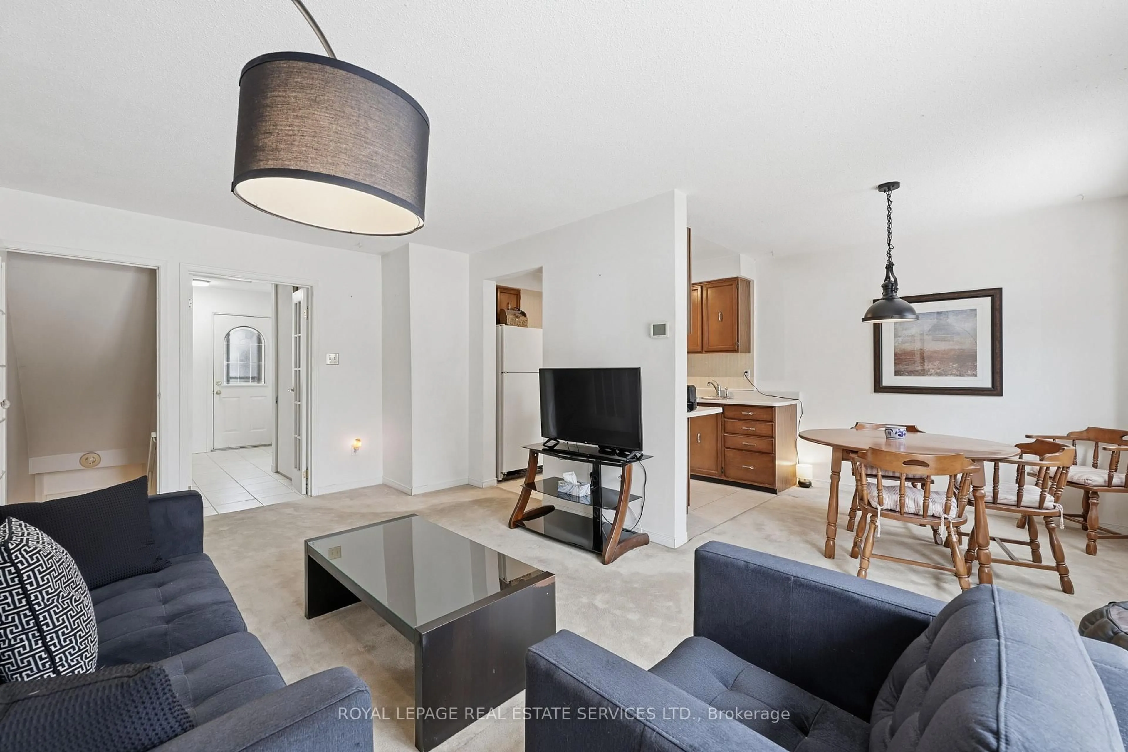 Living room with furniture, unknown for 1526 Lancaster Dr #128, Oakville Ontario L6H 2Z2