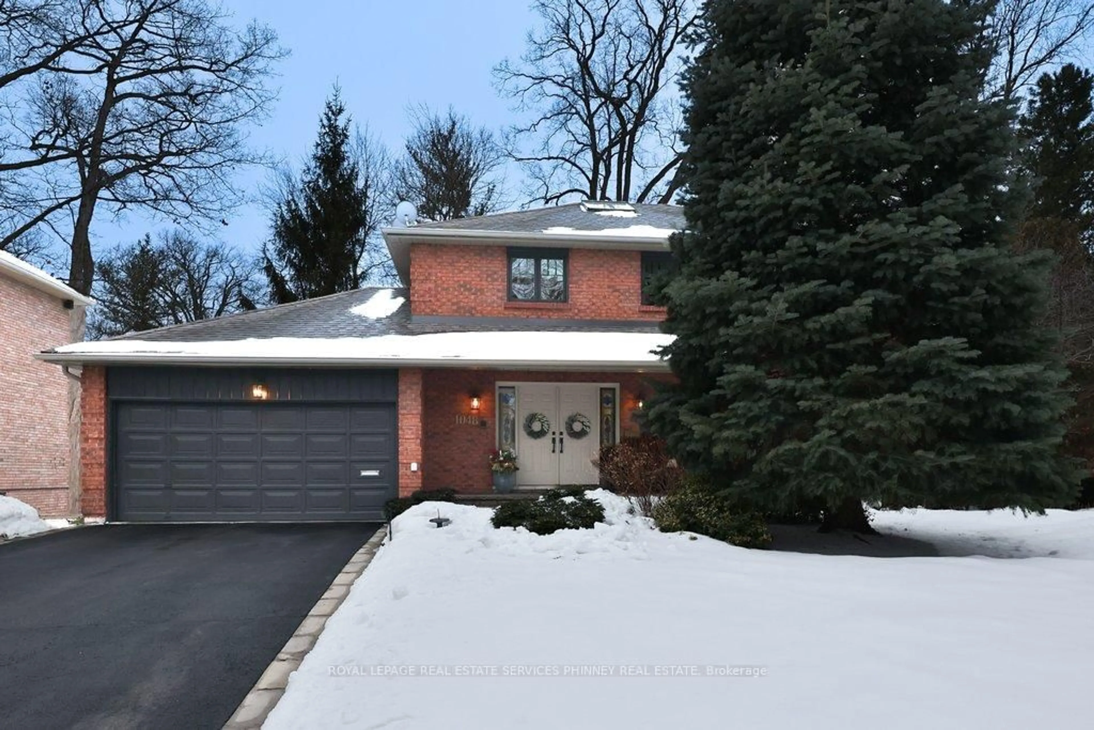 Home with brick exterior material, street for 1048 Veroli Crt, Mississauga Ontario L5H 4B9