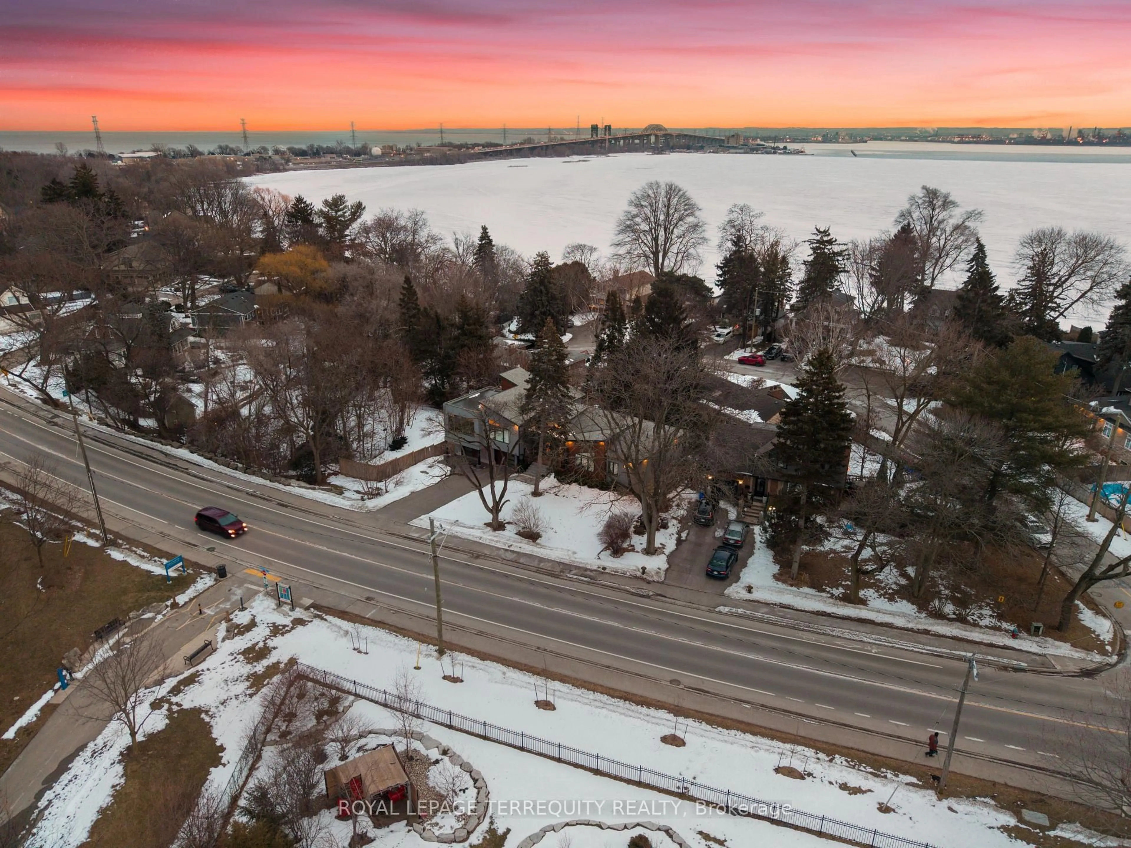 A pic from outside/outdoor area/front of a property/back of a property/a pic from drone, water/lake/river/ocean view for 716 North Shore Blvd, Burlington Ontario L7T 1X6