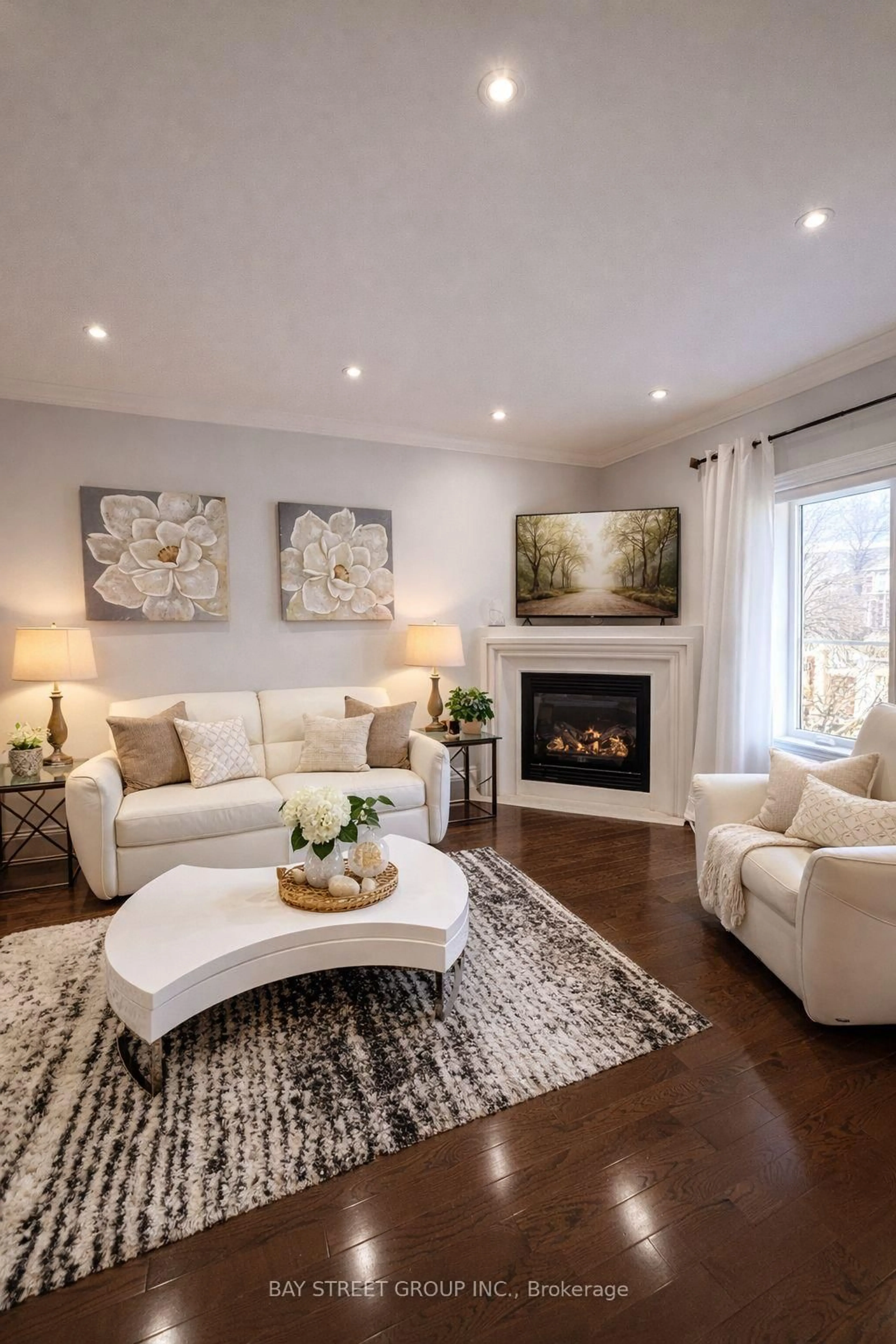 Living room with furniture, wood/laminate floor for 722 Gardner Ave, Mississauga Ontario L5E 1A9