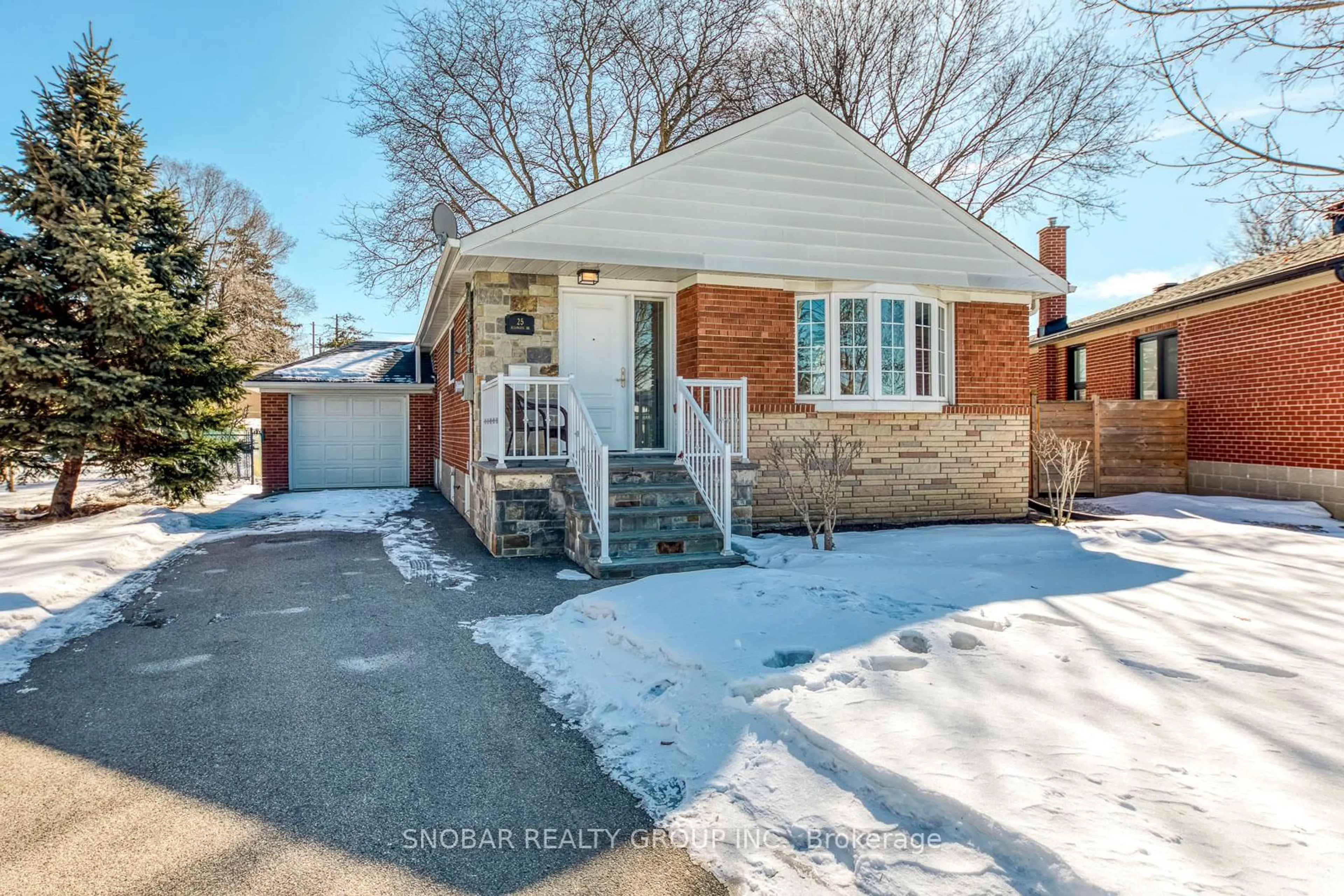 Home with brick exterior material, street for 25 Allonsius Dr, Toronto Ontario M9C 3N4