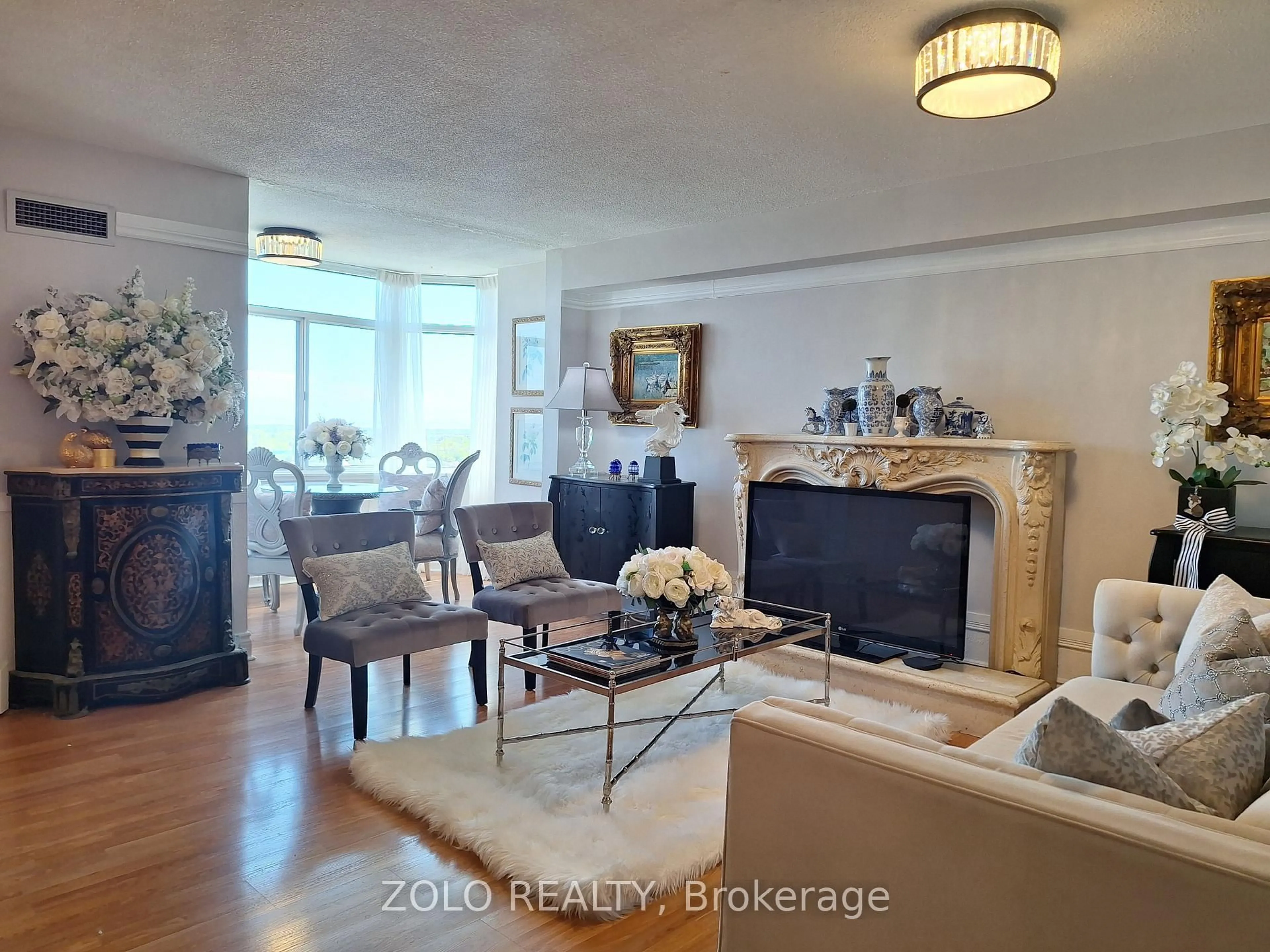 Living room with furniture, unknown for 300 Webb Dr #1001, Mississauga Ontario L5B 3W3