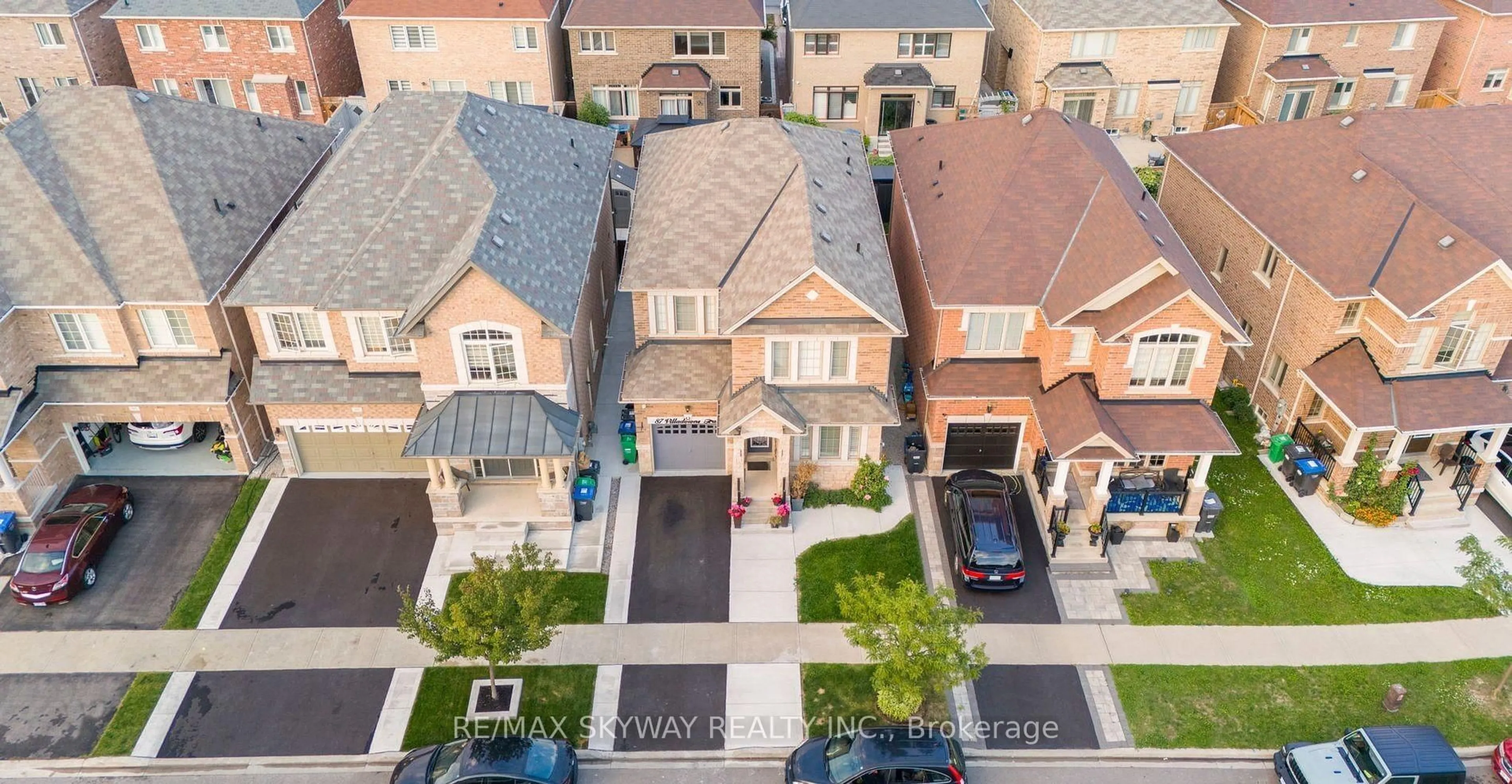 A pic from outside/outdoor area/front of a property/back of a property/a pic from drone, street for 87 Villadowns Tr, Brampton Ontario L6R 3Y8