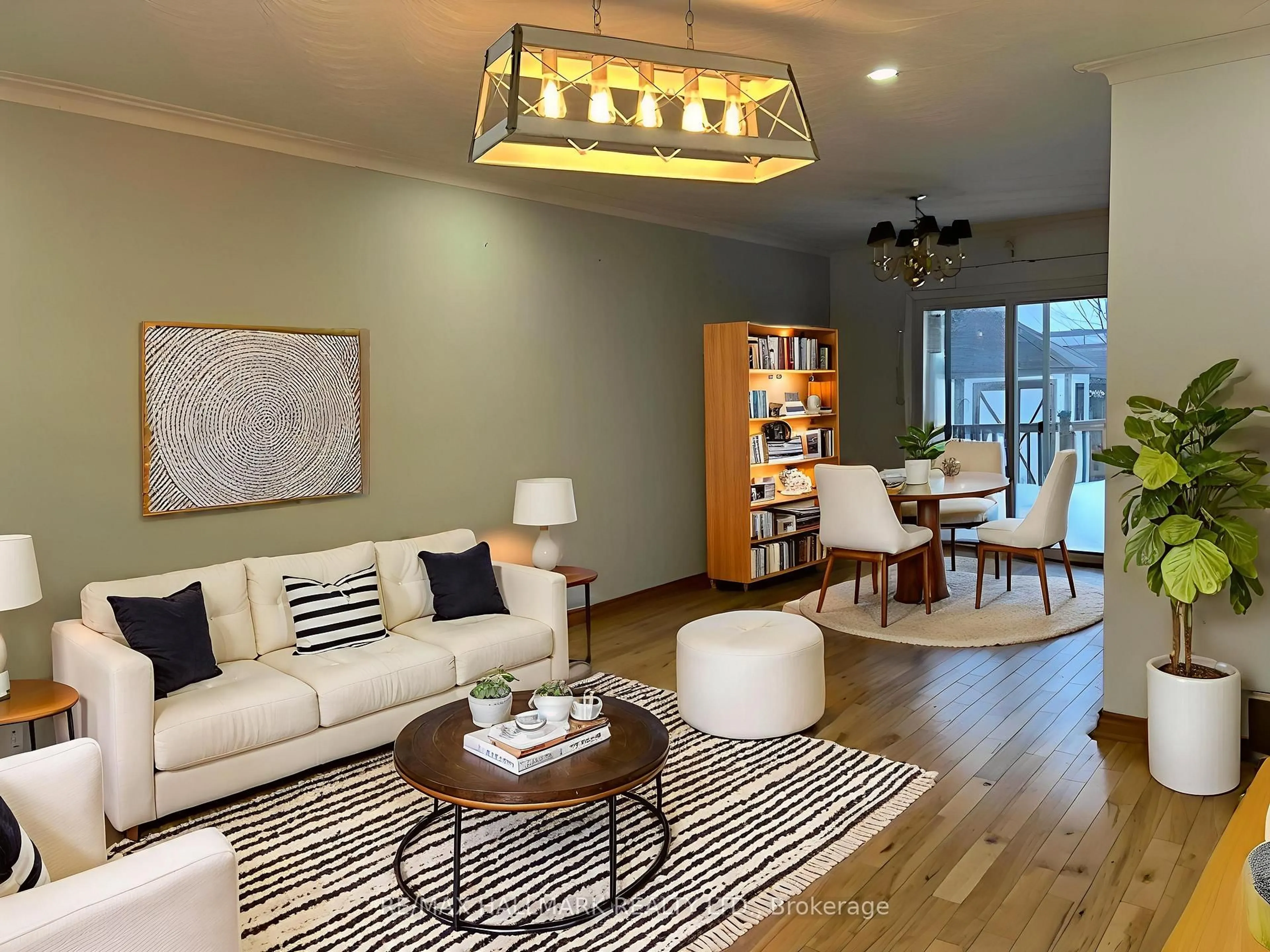 Living room with furniture, wood/laminate floor for 22 Kimbark Dr, Brampton Ontario L6X 2A1